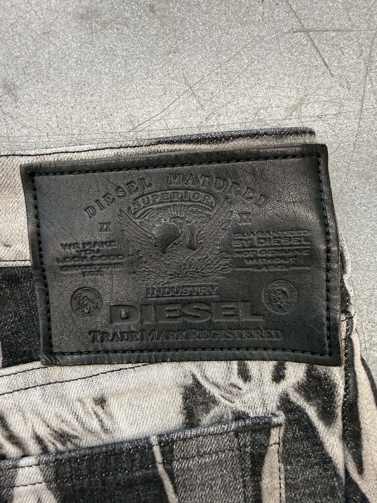 DIESEL INDUSTRY DENIM DIVISION ARCHIVAL COWHIDE LEATHER ABSTRACT PRINT PANTS