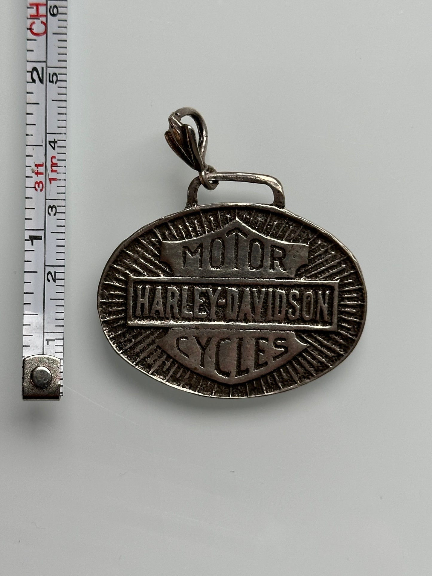 1930'S HARLEY-DAVIDSON OVAL PENDANT (9.4 GRAMS)