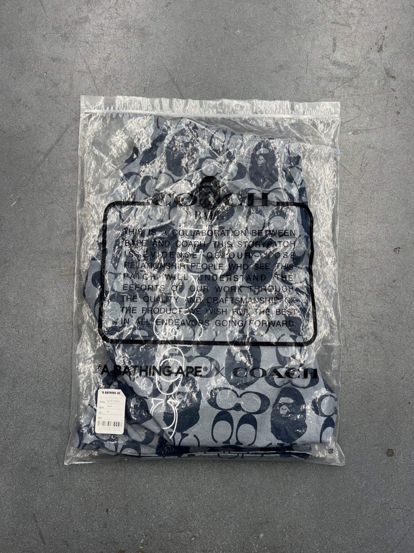 2021 BAPE X COACH SHORTS - NAVY