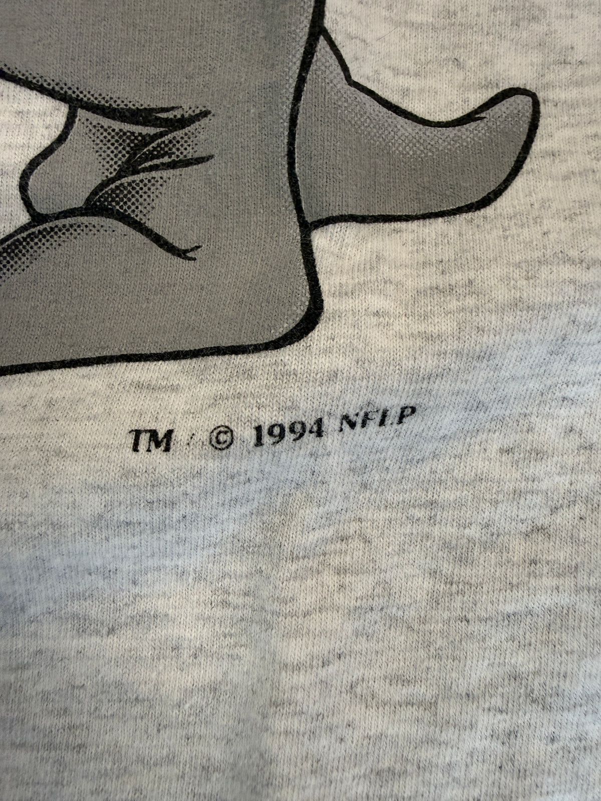 1994 MIAMI DOLPHINS VERTICAL SPELL-OUT ANIMATED DOLPHIN TEE (NUTMEG TAG)