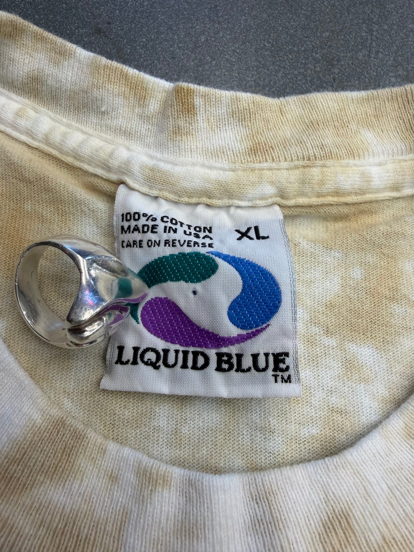 1991 PRESERVE THE RAINFORST AOP TEE (LIQUID BLUE TAG)
