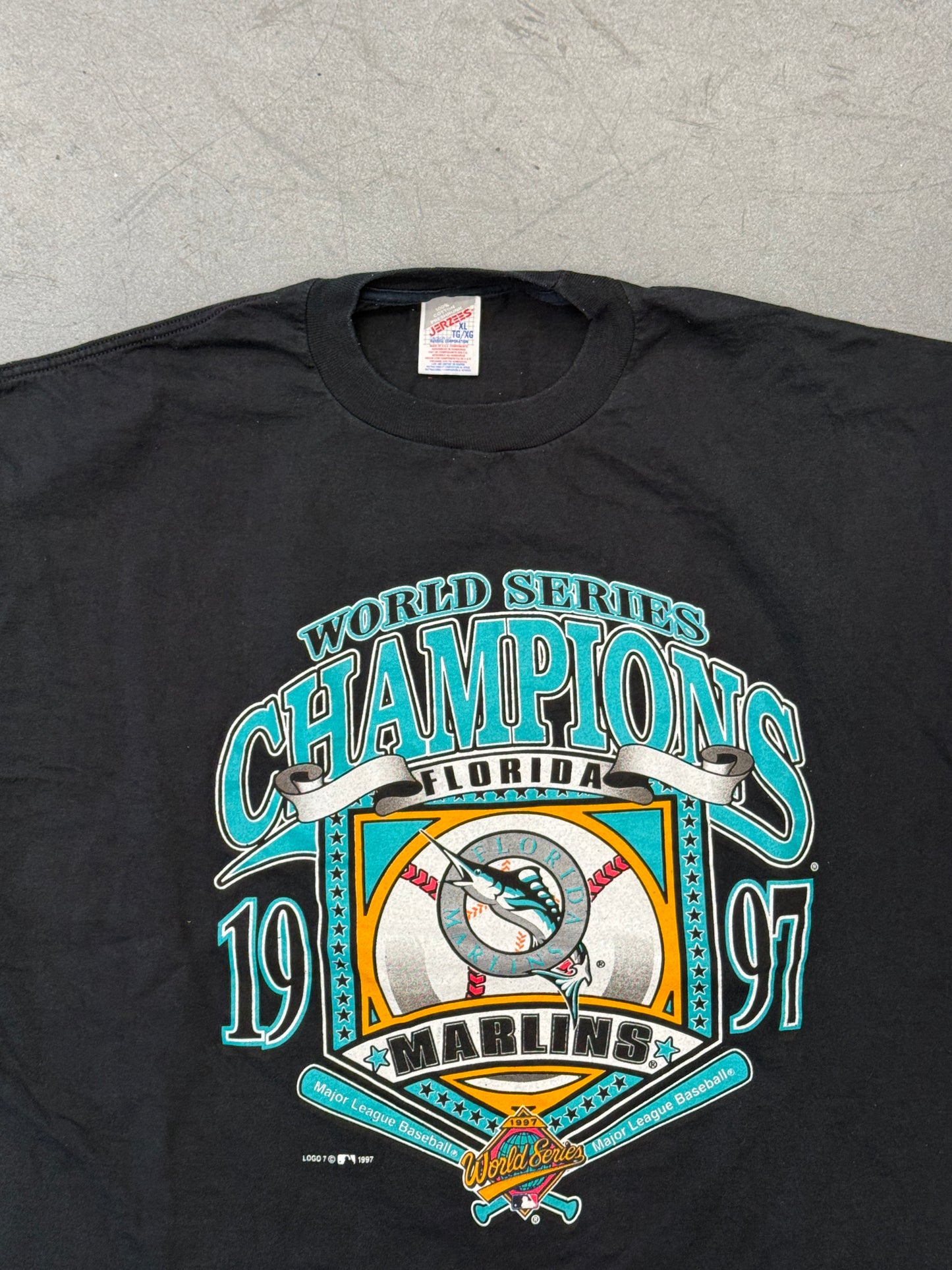 1997 LOGO 7 FLORIDA MARLINS WORLD SERIES CHAMPIONS HOME PLATE LOGO TEE (JERZEES TAG)