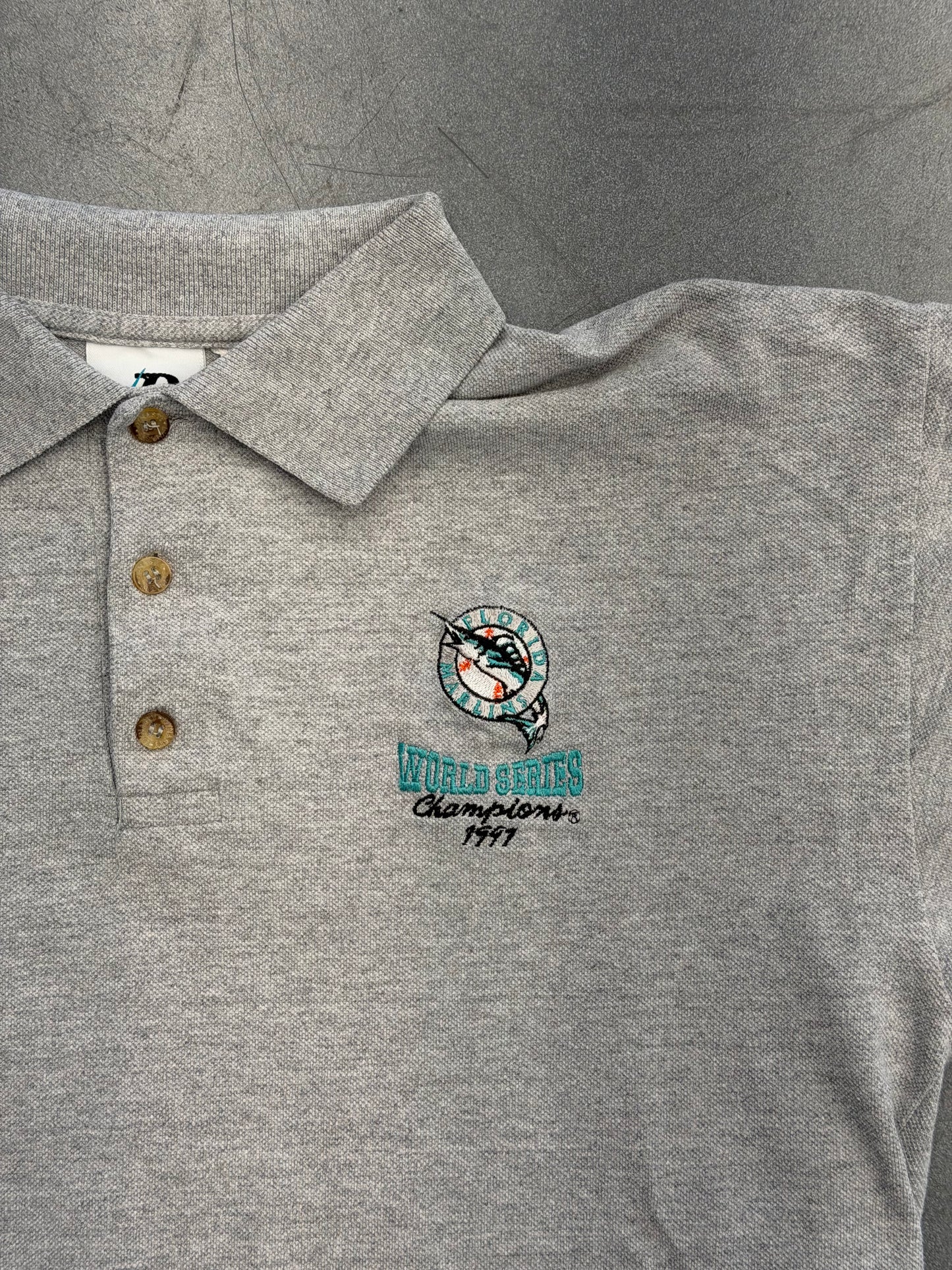 1997 FLORIDA MARLINS WORLD SERIES CHAMPIONS POLO (DYNASTY TAG)