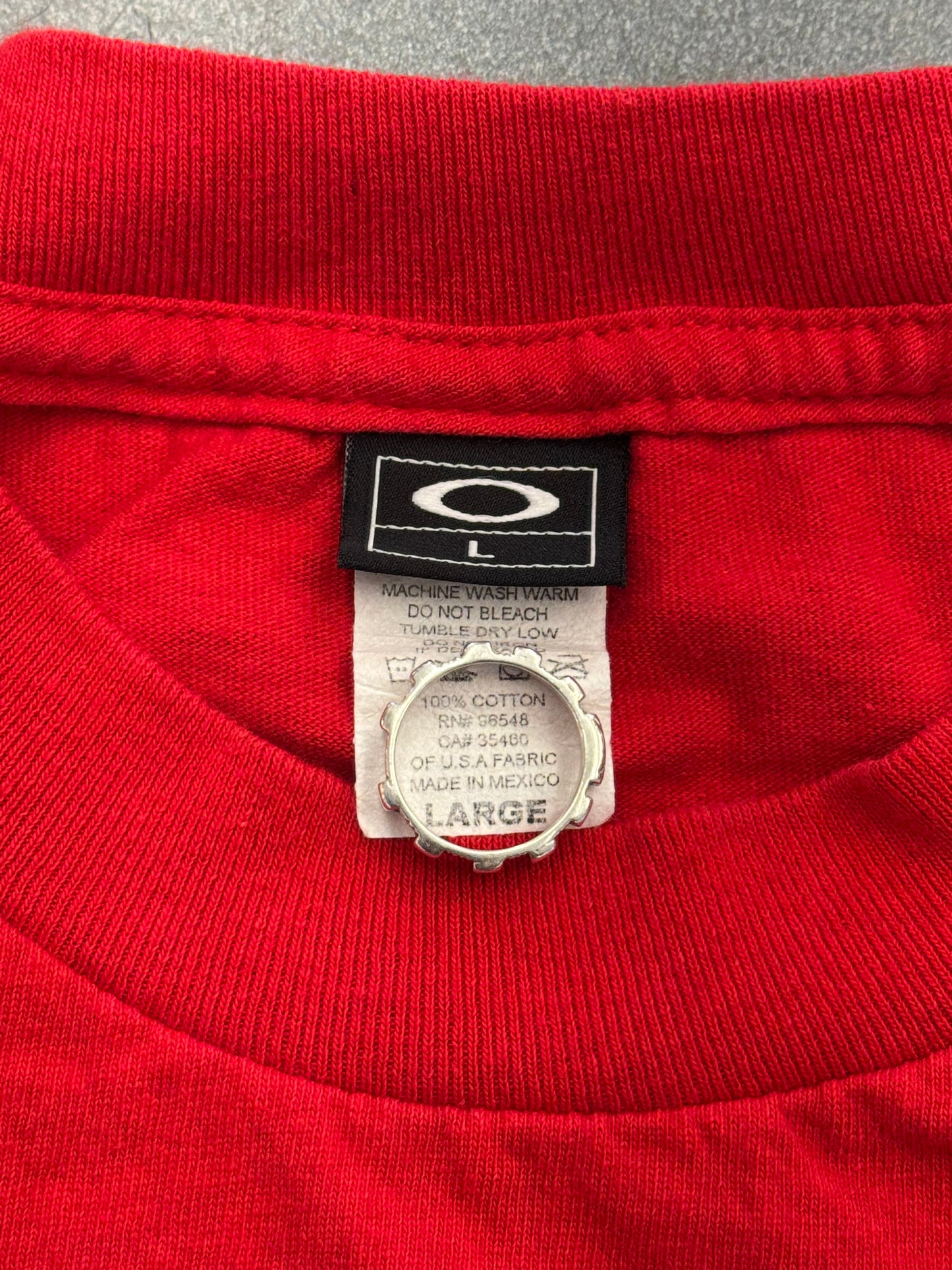 VINTAGE OAKLEY CRACKLED SPELL-OUT LOGO TEE - RED (BLACK TAG)