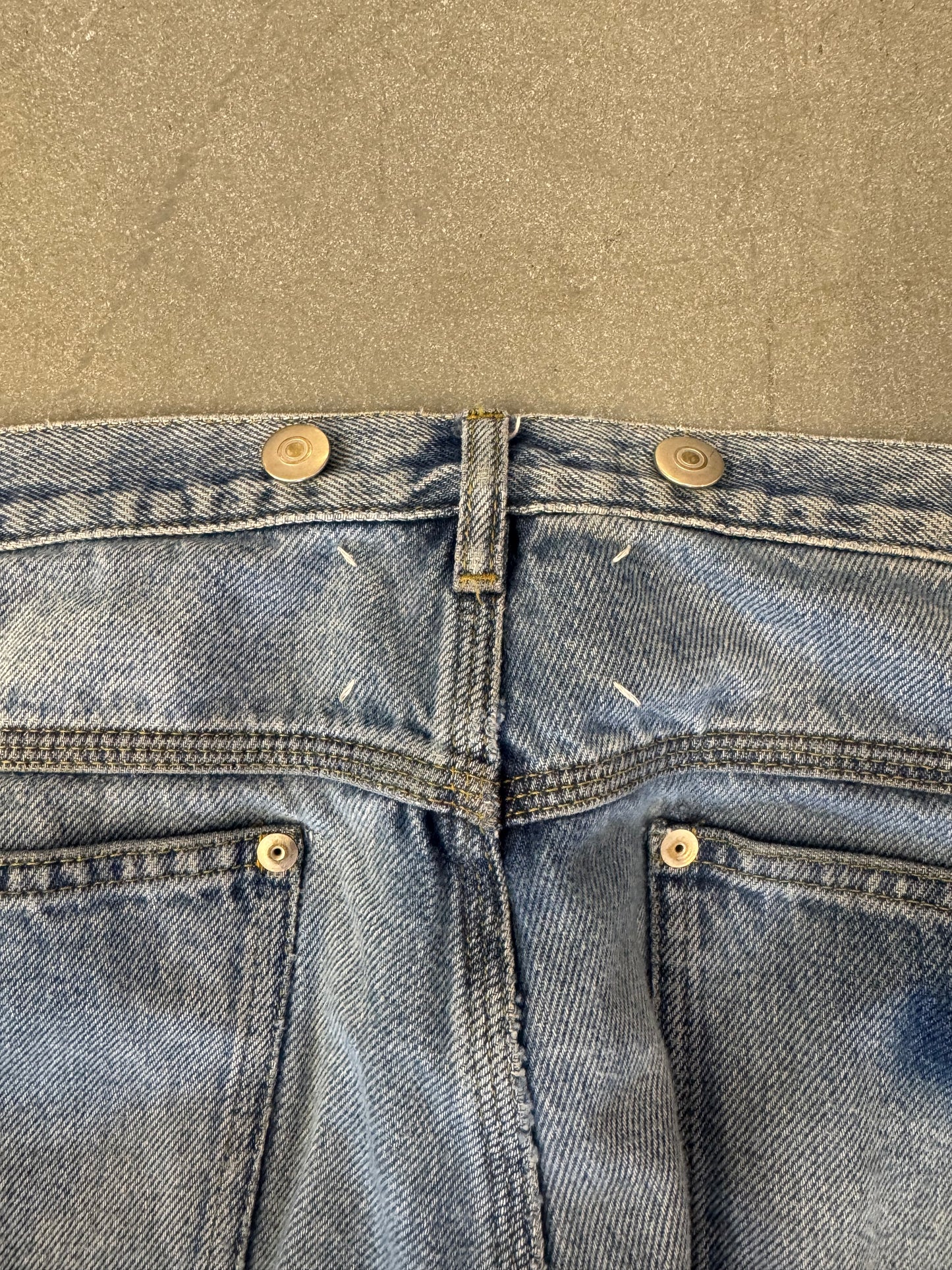 MAISON MARGIELA DISTRESSED SUSPENDER BUTTON REGULAR FIT JEANS - REPAIRED