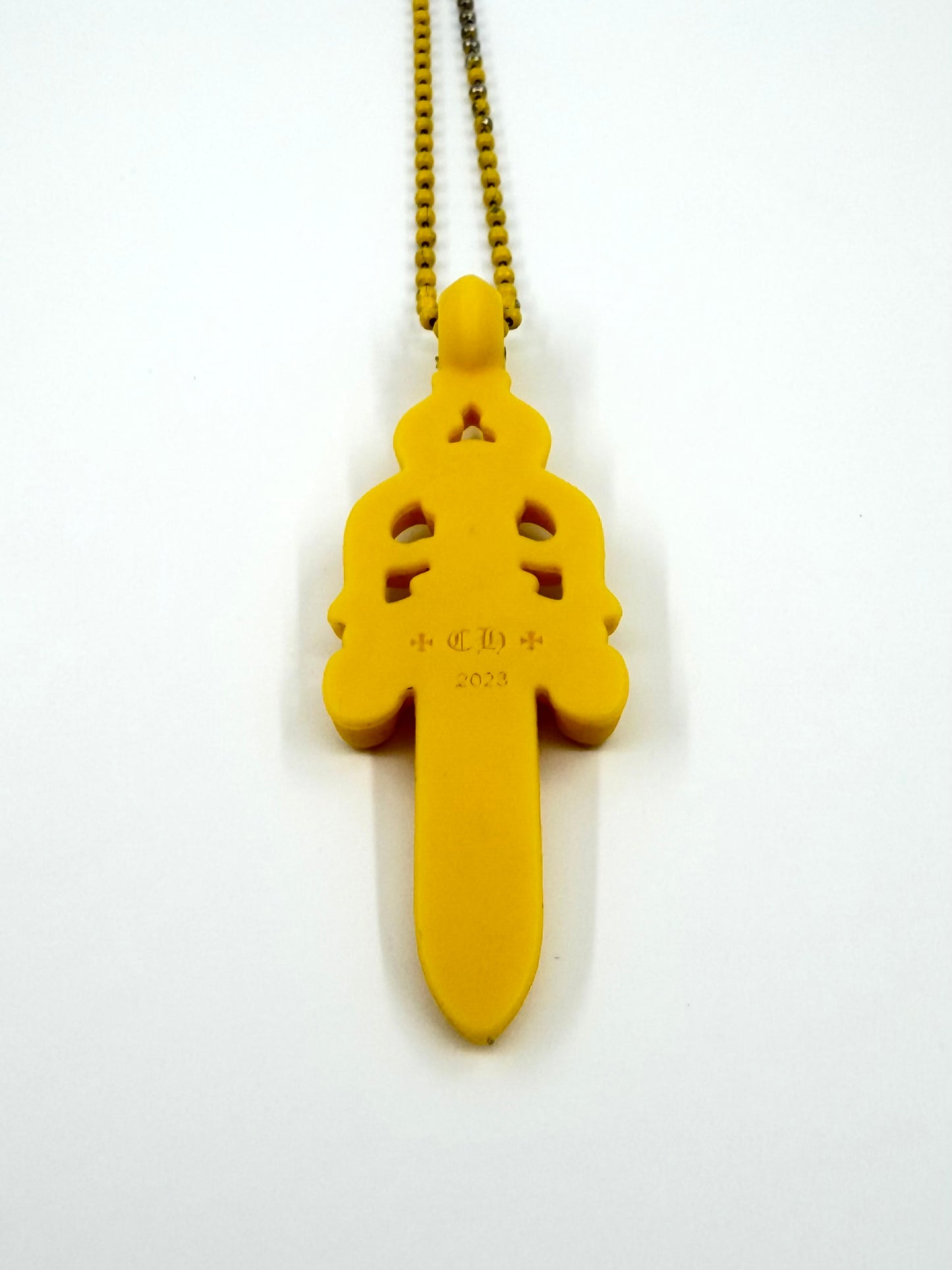 CHROME HEARTS SILICONE DAGGER PENDANT - YELLOW