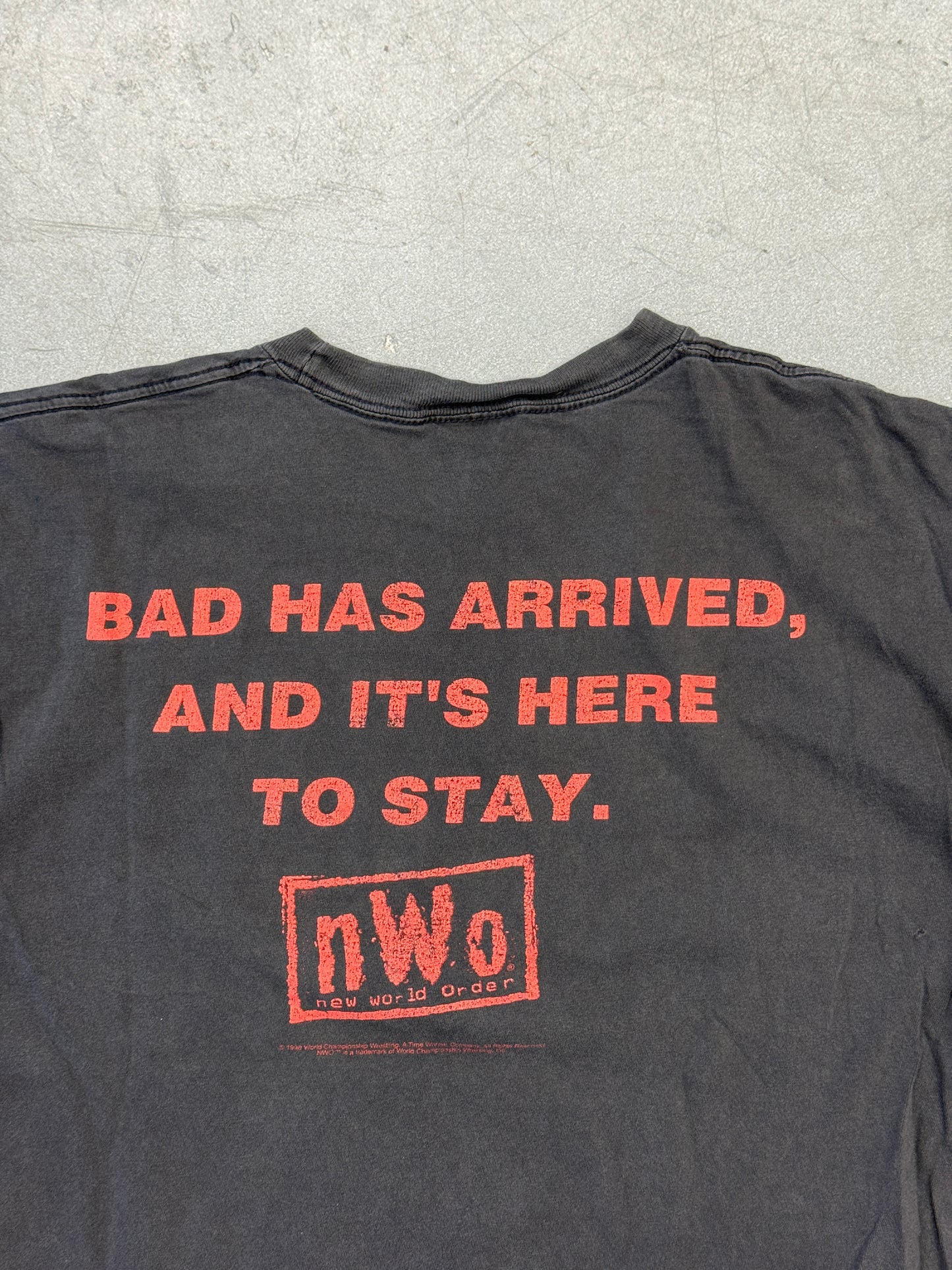 1998 NWO BAD HAS ARRIVED, AND IT'S HERE TO STAY TEE (CHAMP TAG)