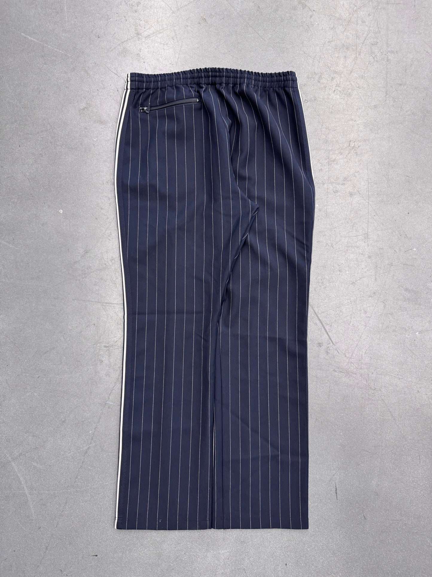 NEEDLES X KITH PINSTRIPE TRACK PANTS