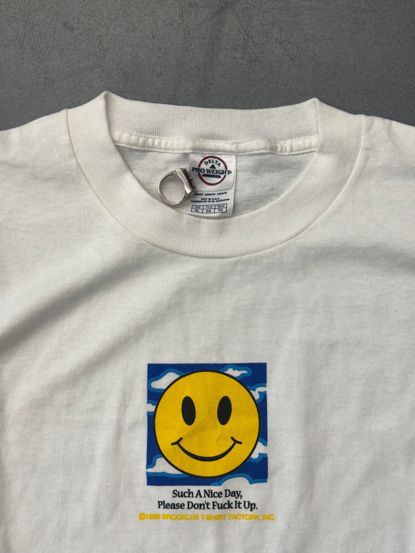 1999 "SUCH A NICE DAY, PLEASE DON'T FUCK IT UP." SMILEY FACE TEE (DELTA TAG)