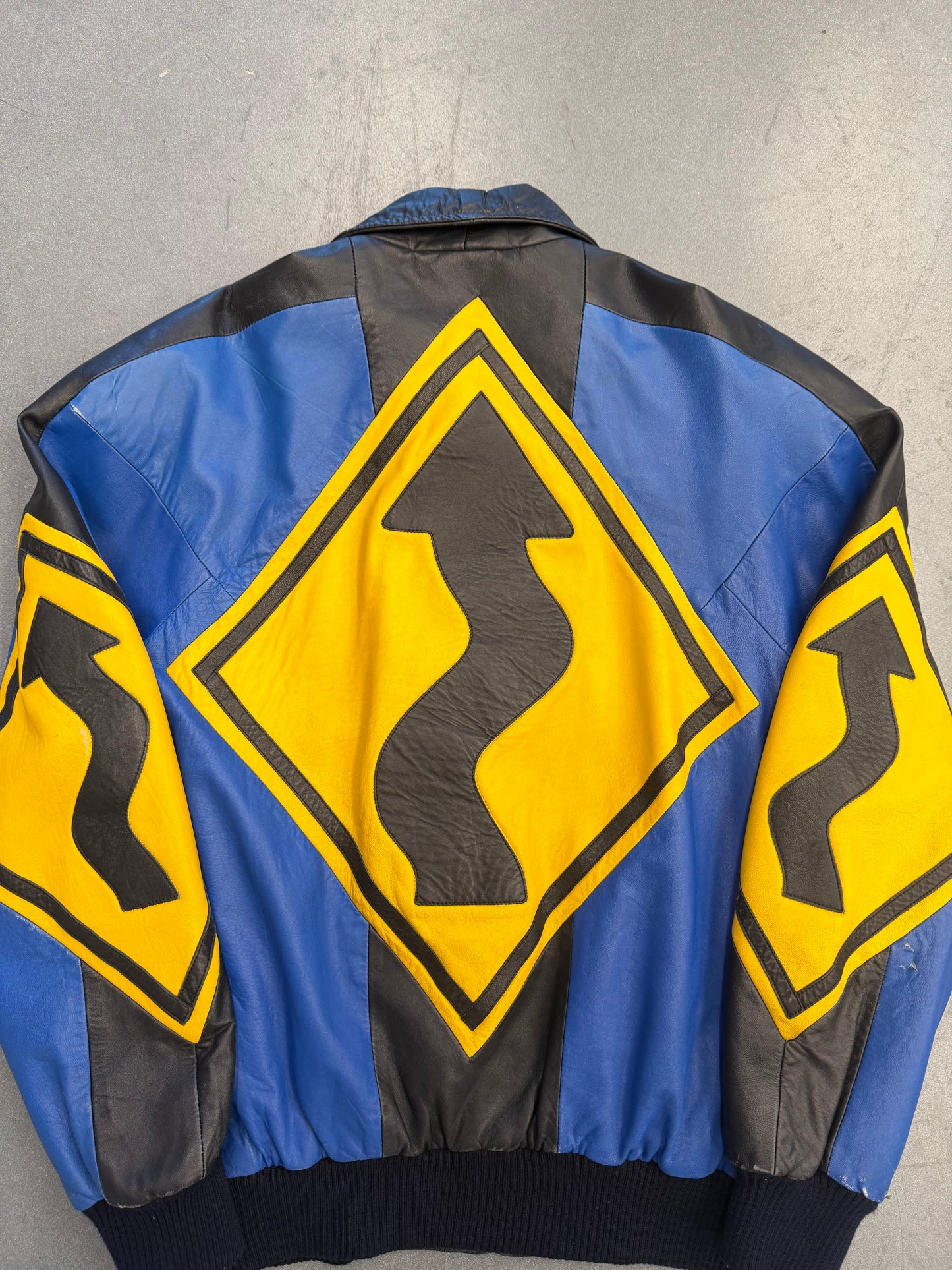 VINTAGE MICHAEL HOBAN NORTH BEACH STREET SIGN LEATHER JACKET - BLUE/YELLOW (S)