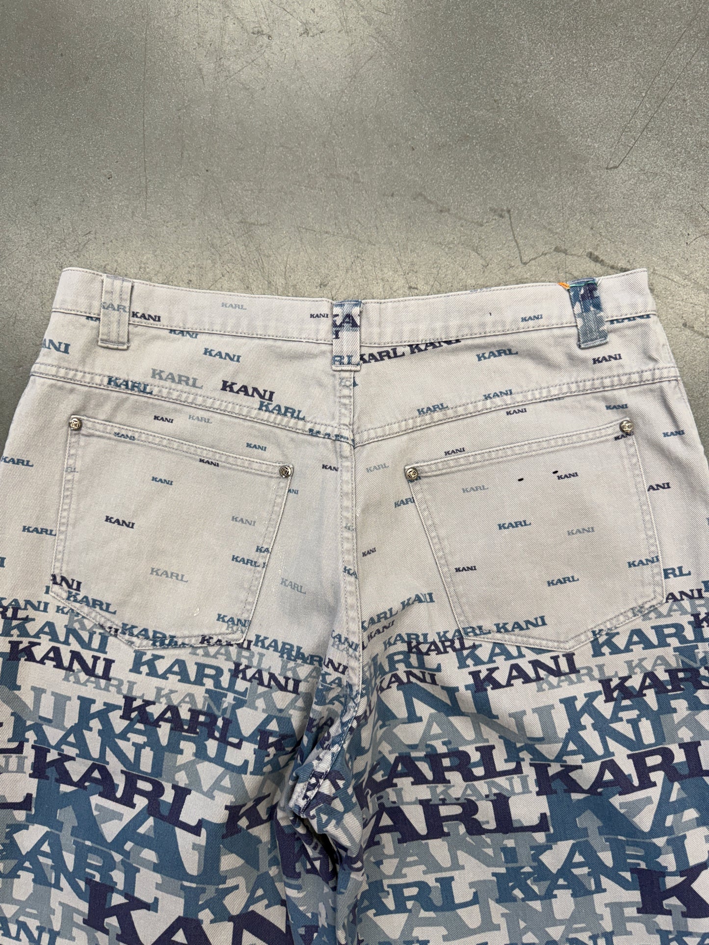 90'S KARL KANI AOP TEXT JEANS