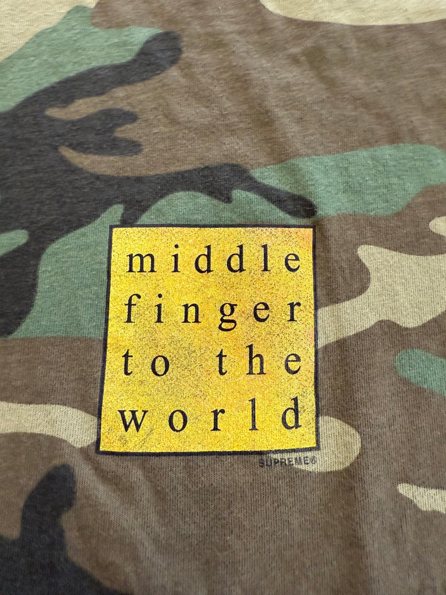SS19 SUPREME MIDDLE FINGER TO THE WORLD TEE - WOODLAND CAMO