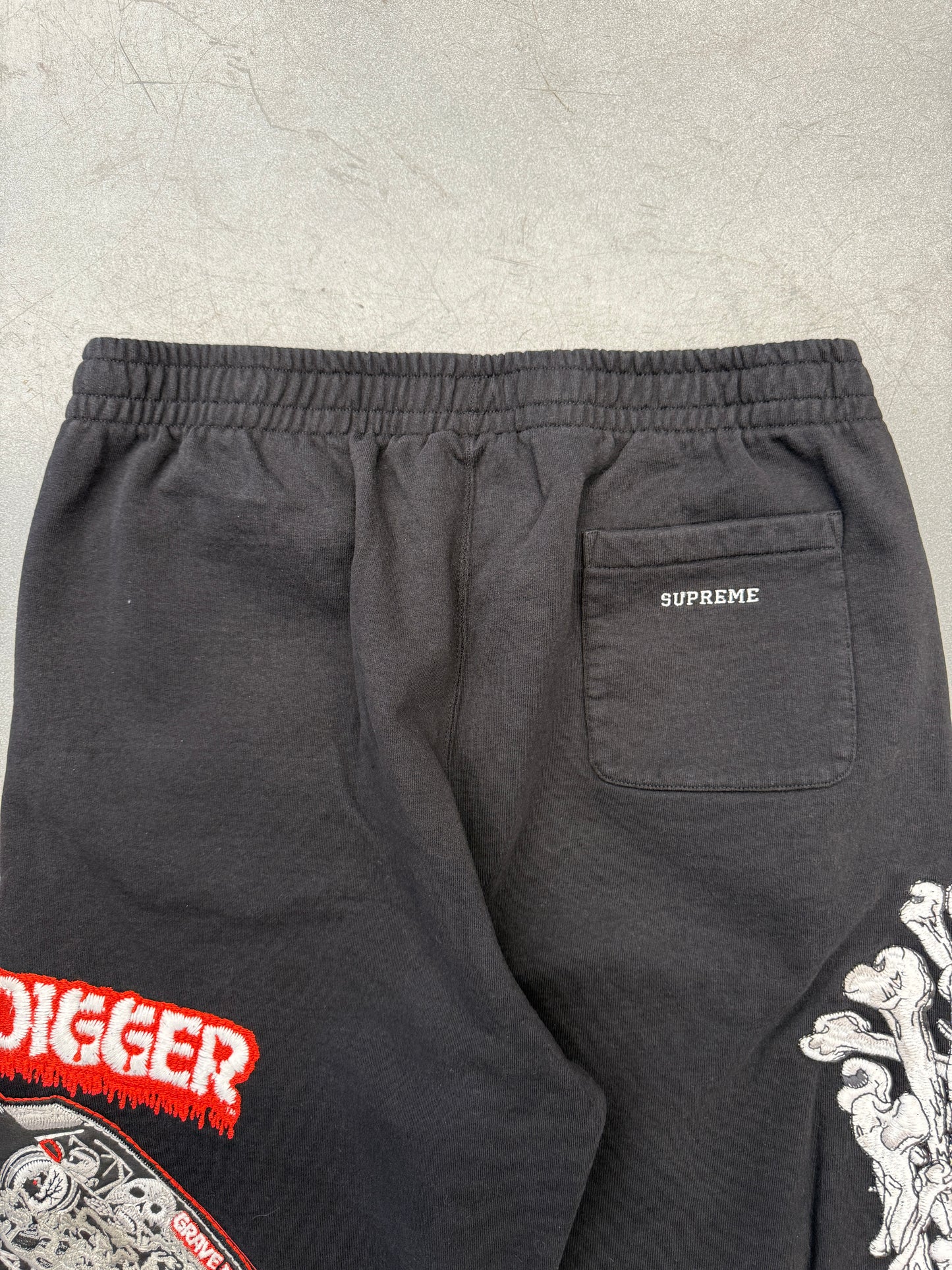 SS26 SUPREME MONSTER JAM GRAVE DIGGER BONES SWEATPANTS