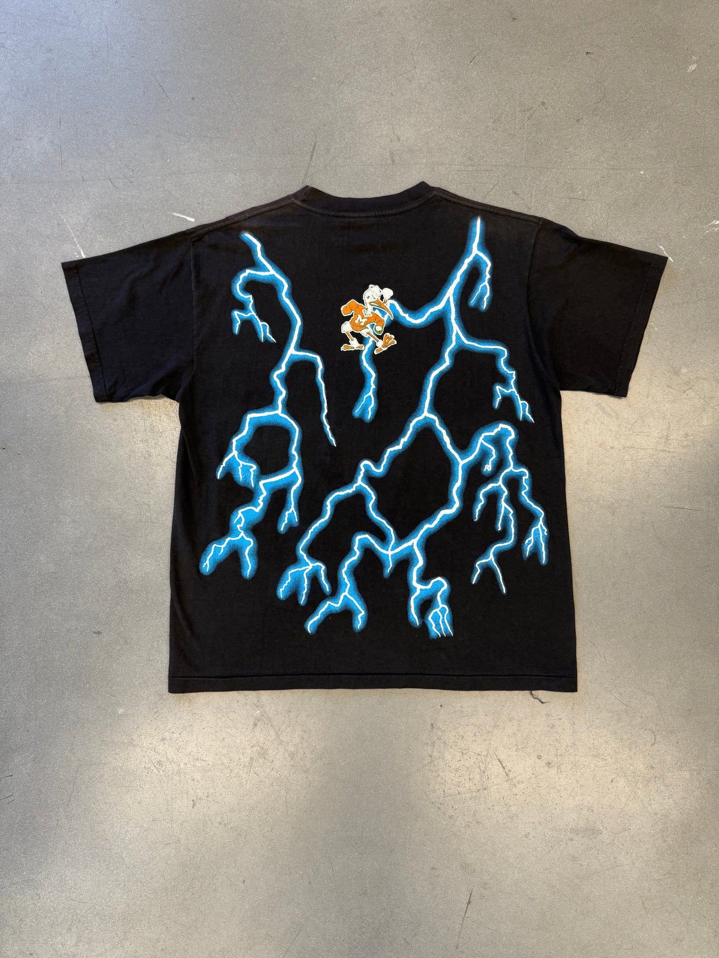 MIAMI HURRICANES SEBASTIAN LIGHTNING TEE SUNRISE SPORTWEAR (TULTEX TAG)