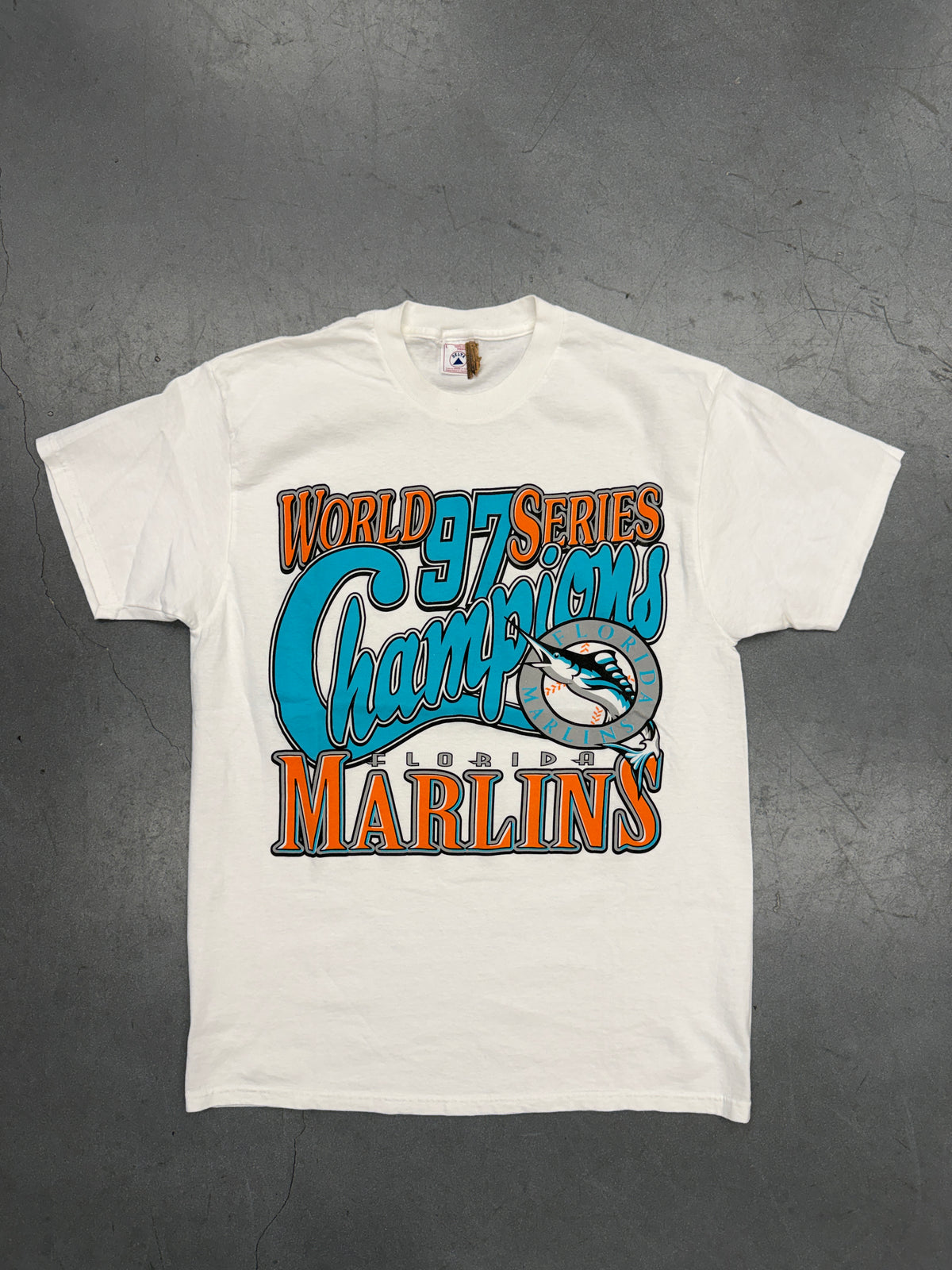 1997 FLORIDA MARLINS 97 WORLD SERIES CHAMPIONS TEE (DELTA TAG)