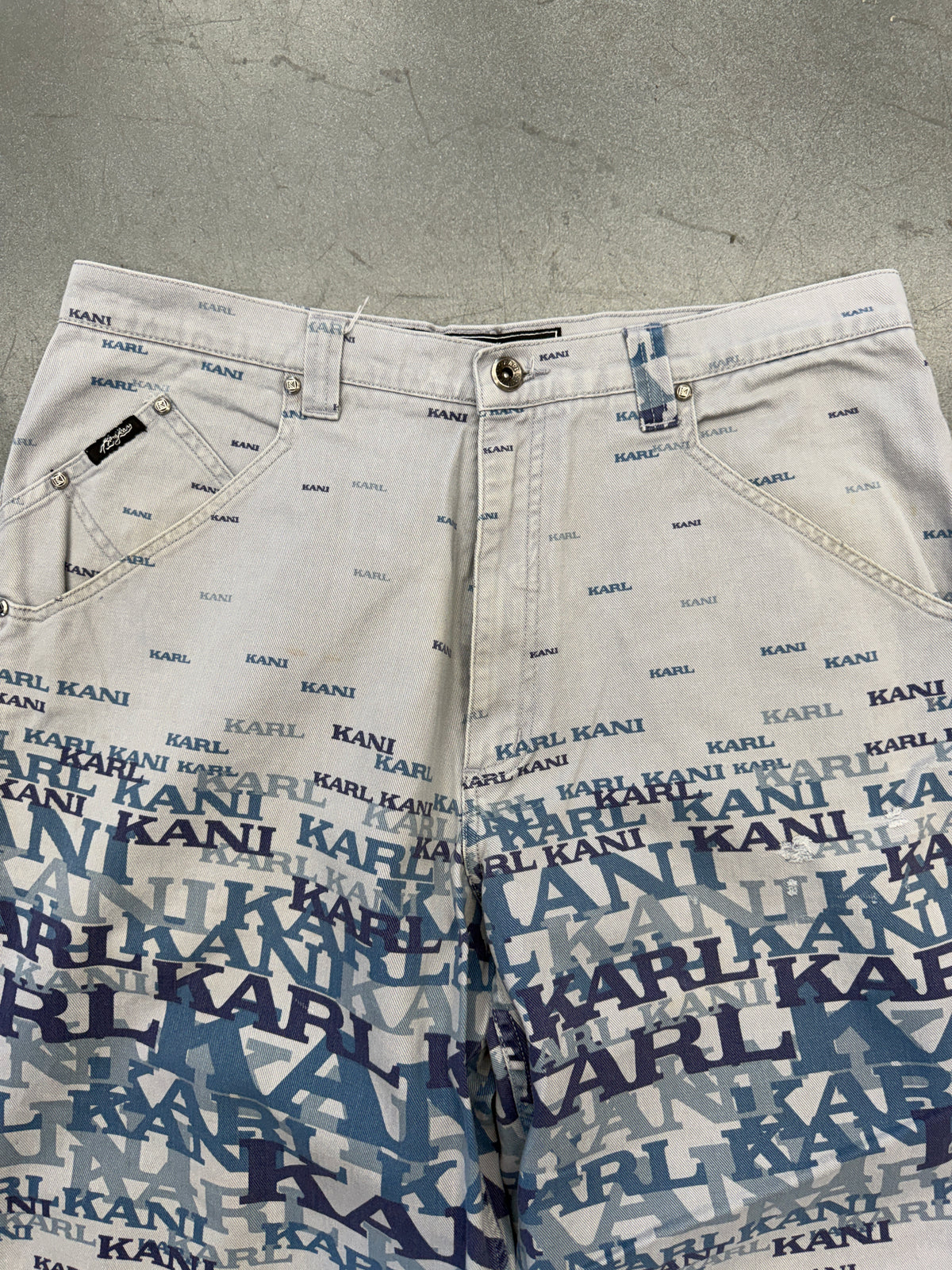 90'S KARL KANI AOP TEXT JEANS