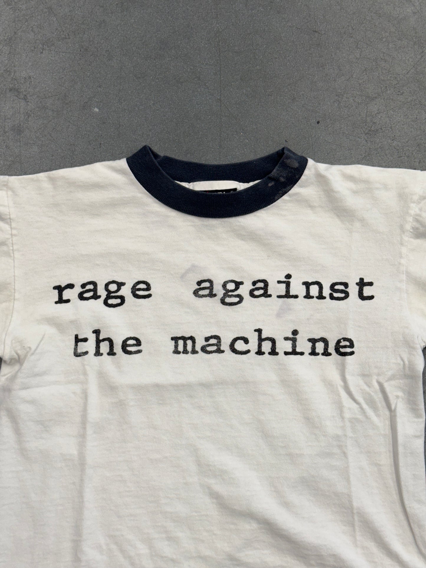 90S RAGE AGAINST THE MACHINE UNITED NATIONS REPORT BABY RINGER TEE (GIANT TAG)