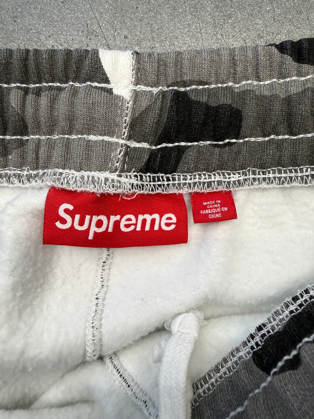 SS26 SUPREME SATIN APPLIQUE SWEATPANTS - SNOW CAMO
