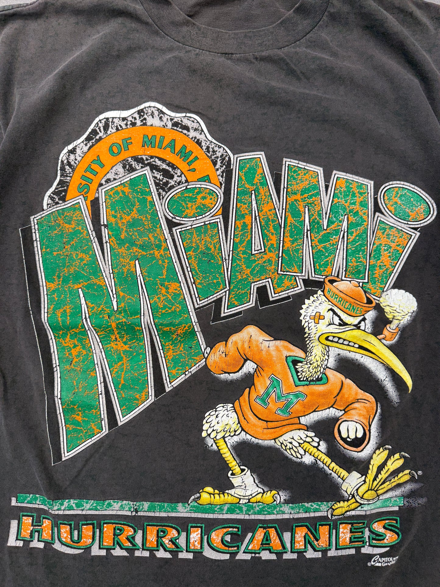 90S UNIVERSITY OF MIAMI HURRICANES CRACKLED CAPITOL GRAPHICS TEE (PULLED TAG)