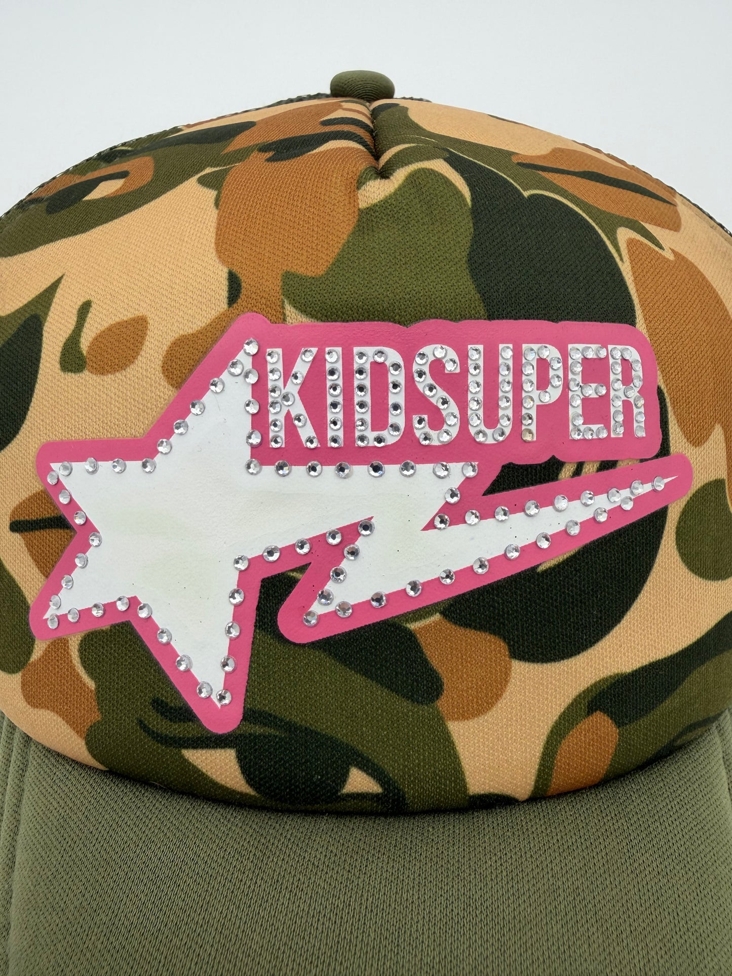 BAPE X KIDSUPER BAPE STA LOGO RHINESTONE TRUCKER - CAMO/PINK