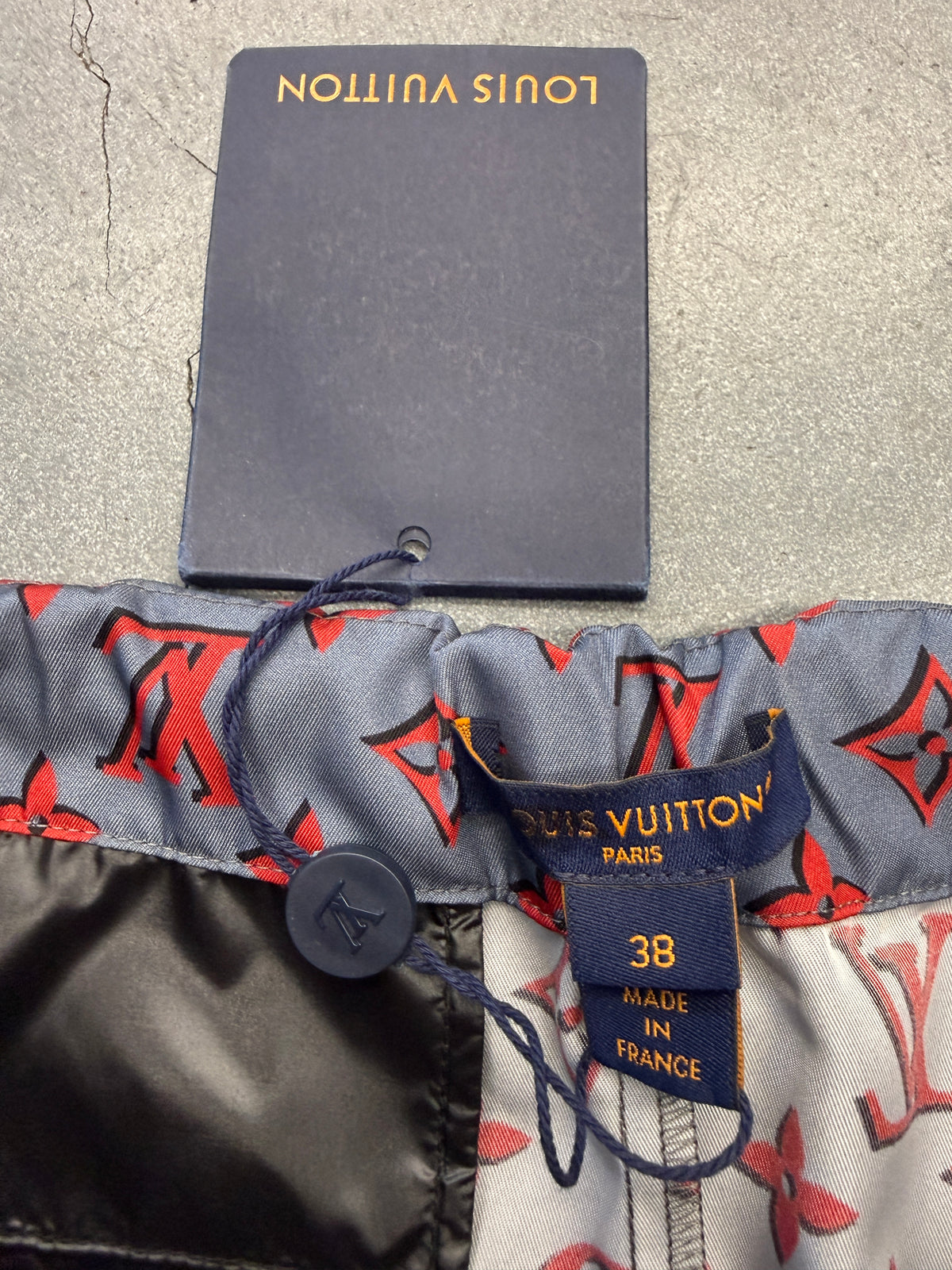 FW23 LOUIS VUITTON RED MONOGRAM TECHNICAL RUNNING SHORTS
