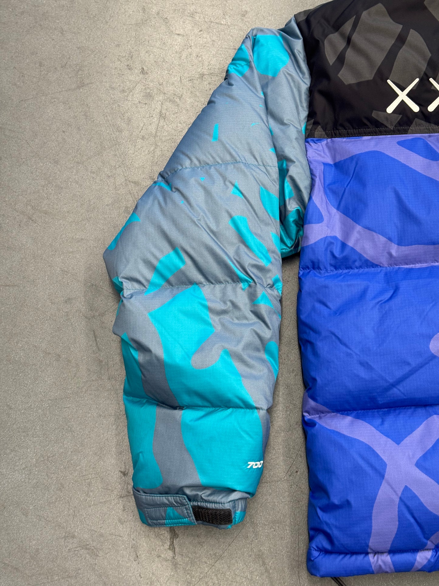 KAWS X THE NORTH FACE RETRO 1996 JACKET - MONTEREY BLUE NUPTSE PRINT