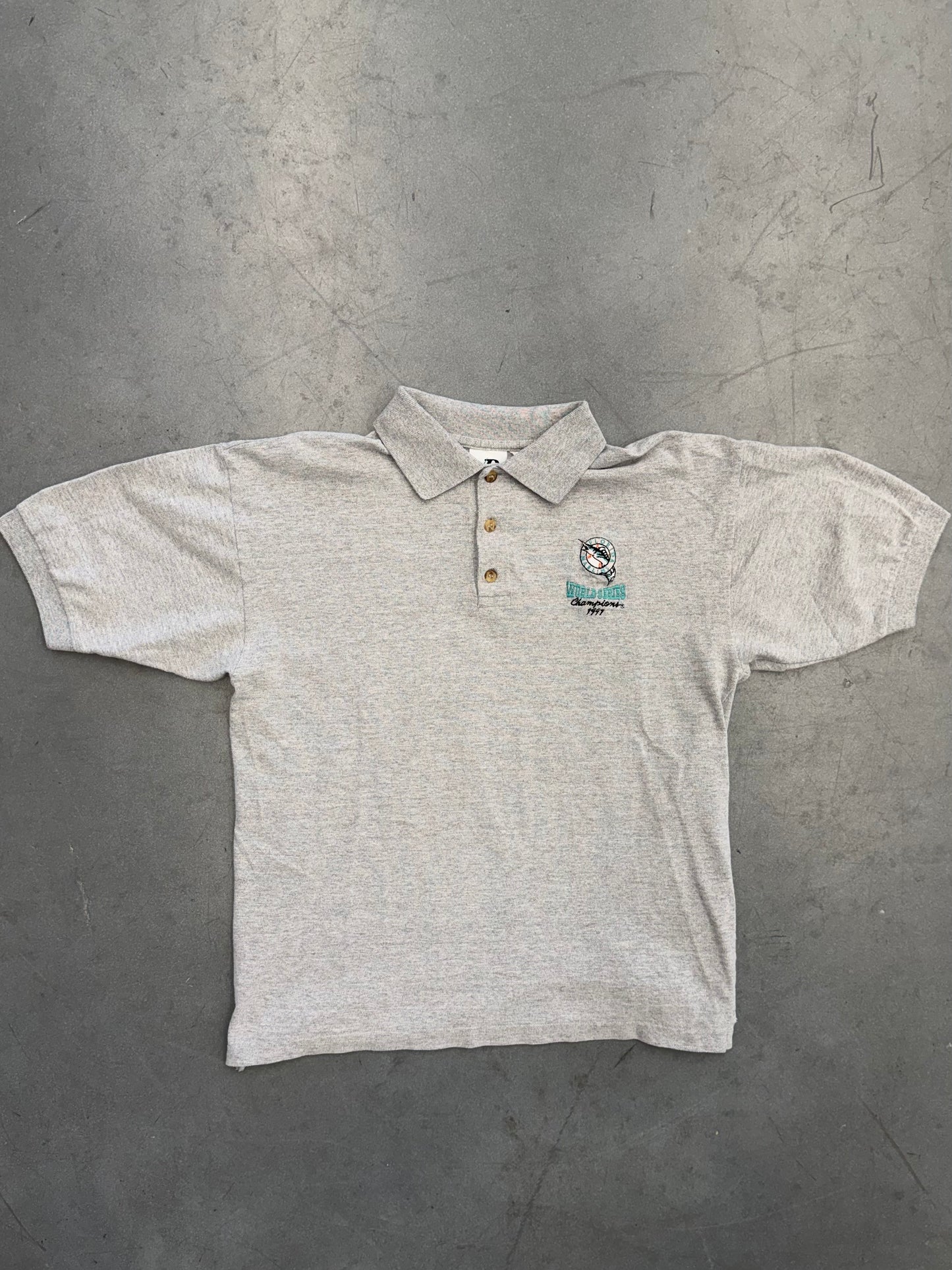 1997 FLORIDA MARLINS WORLD SERIES CHAMPIONS POLO (DYNASTY TAG)