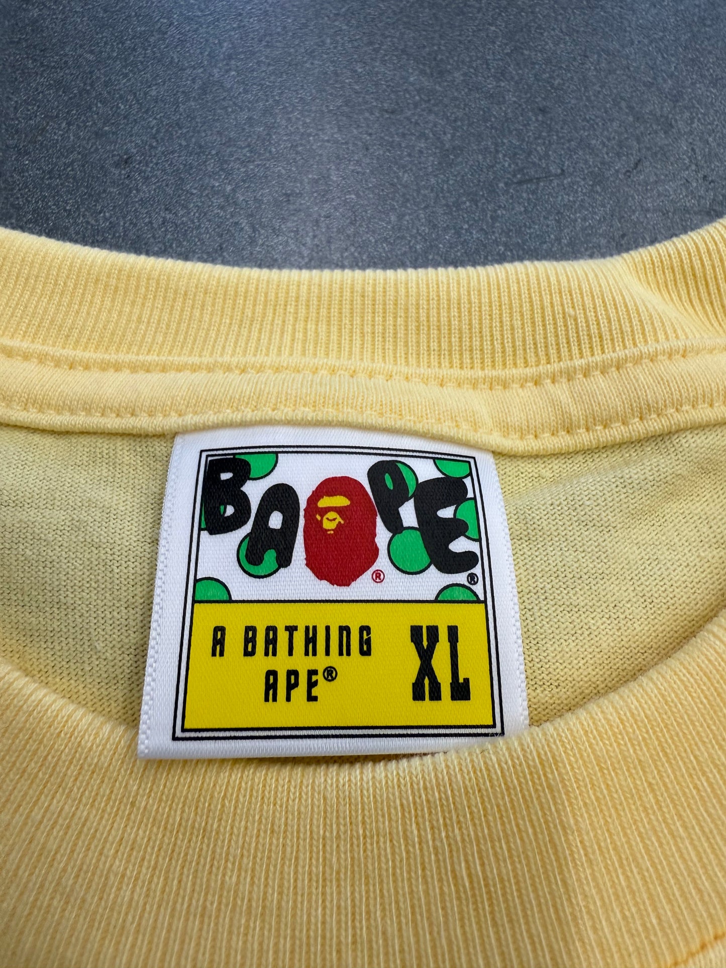 A BATHING APE COLLEGE TEE - YELLOW (XL) (NEW IN BAG)