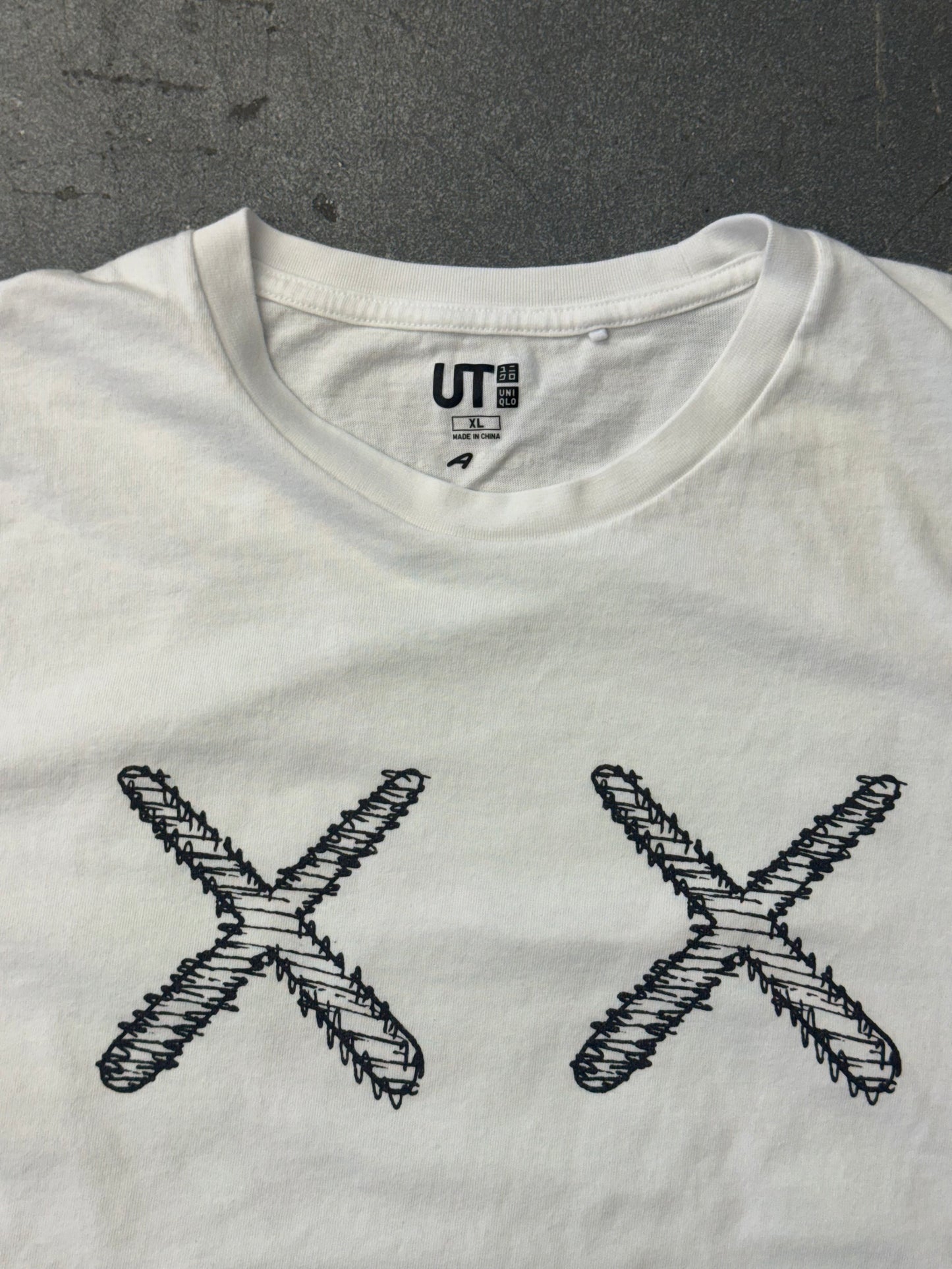 KAWS X UNIQLO SKELETON NEW FICTION TEE