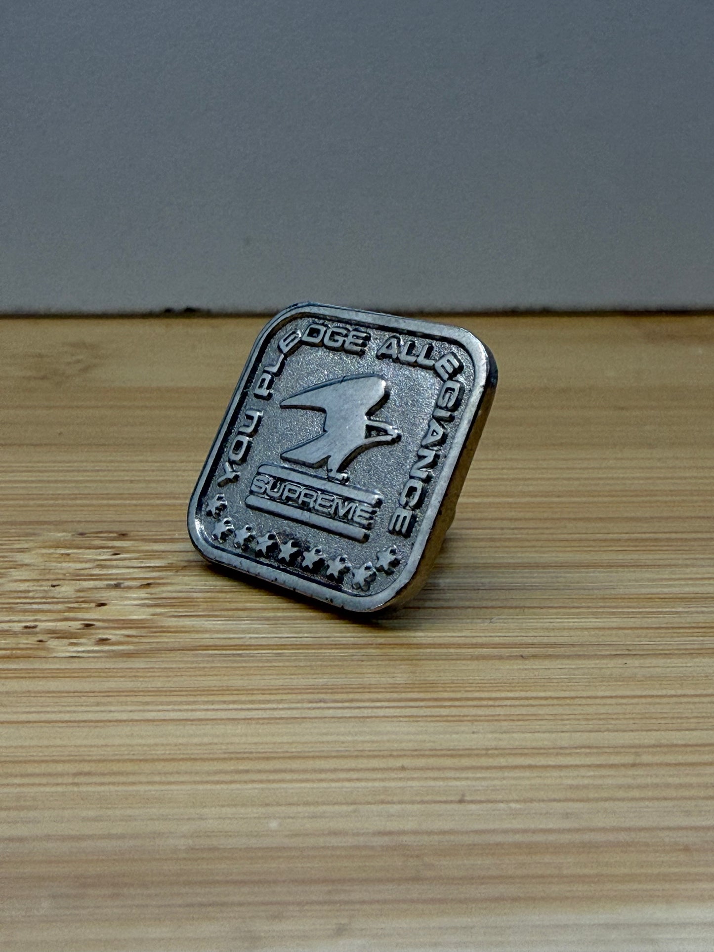 FW19 SUPREME PLEDGE ALLEGIANCE PIN - SILVER