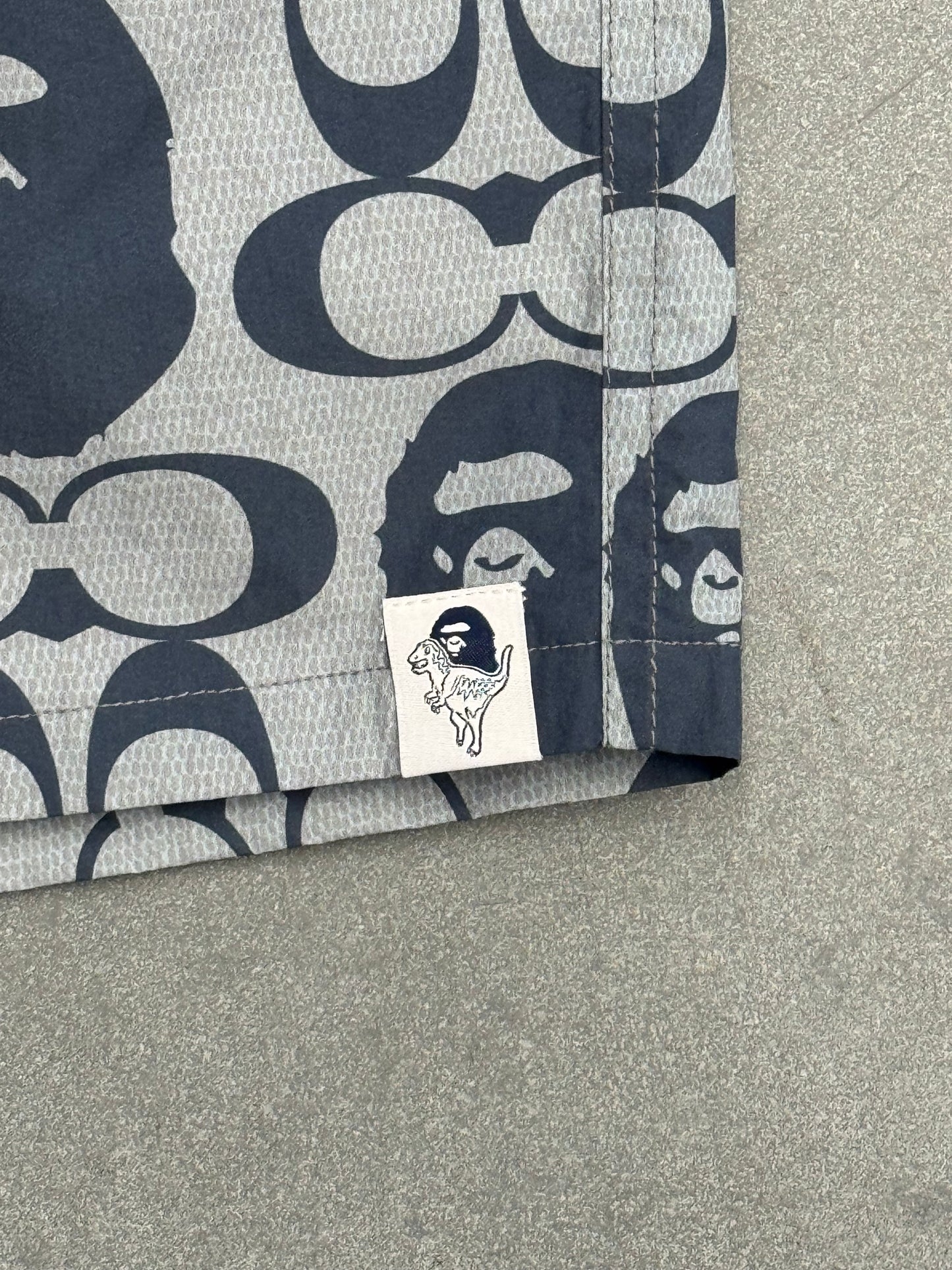 2021 BAPE X COACH SHORTS - NAVY