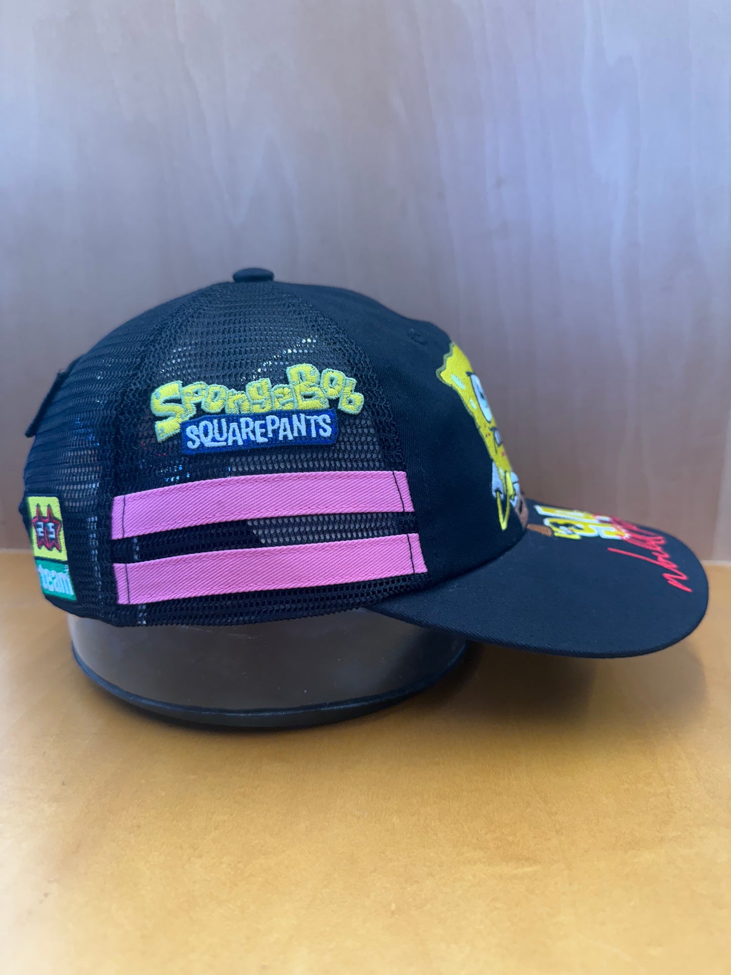 SS25 SUPREME SPONGEBOB JEFF HAMILTON MESH BACK TRUCKER HAT BLACK/PINK