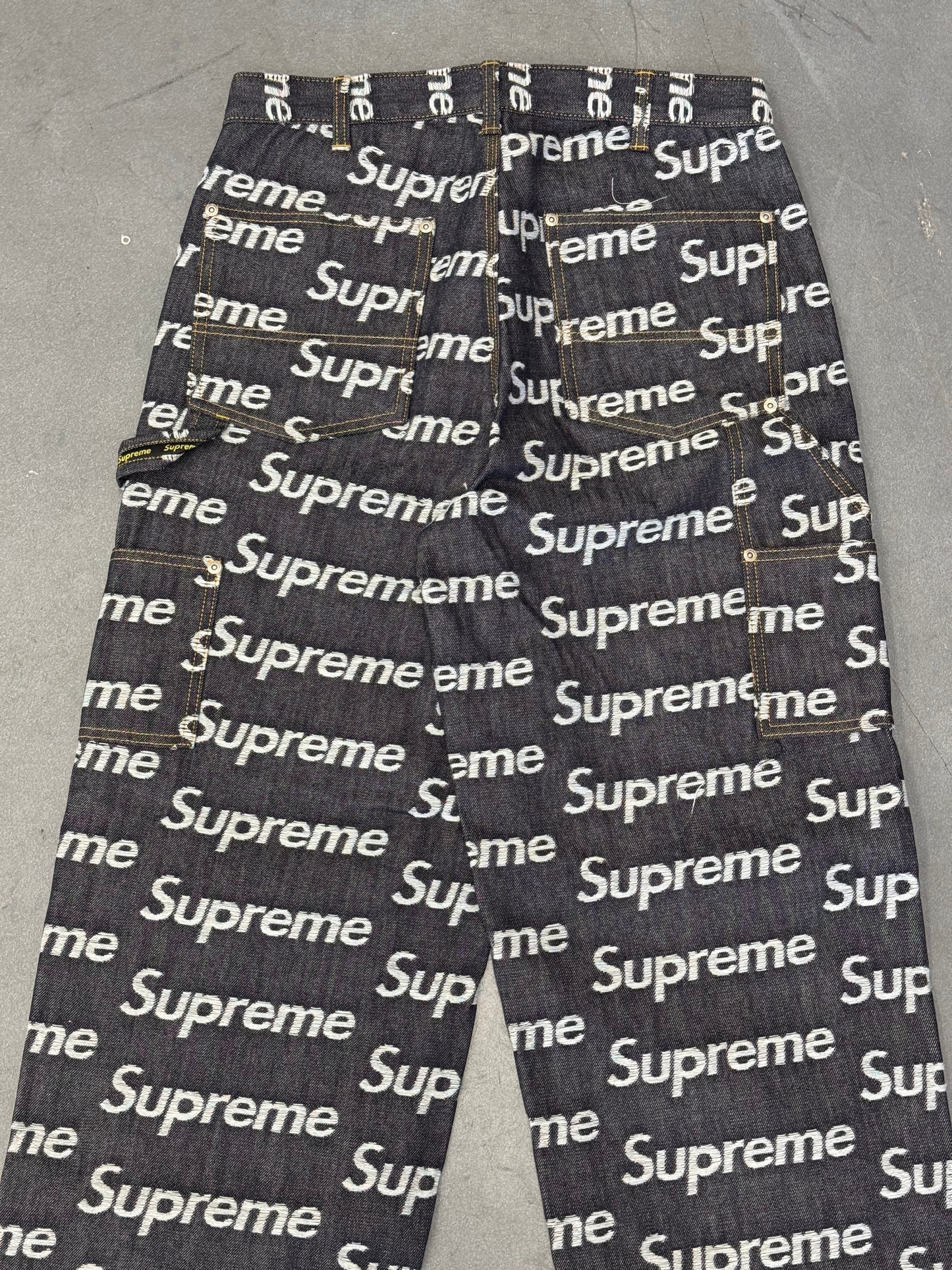 FW25 SUPREME JACQUARD LOGOS DOUBLE KNEE DENIM PAINTER JEAN - RIGID INDIGO