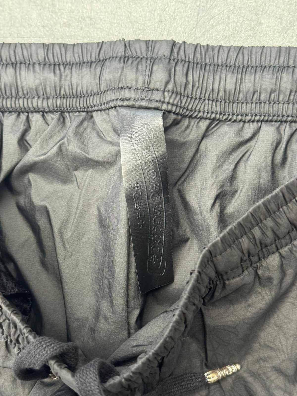 CHROME HEARTS MONOGRAM TRASH PICK UP TRACK PANTS