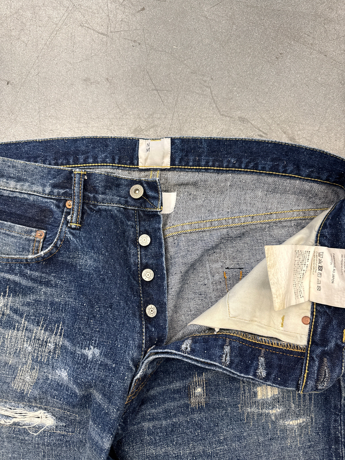 AD24 JUNYA WATANABE EYE NM DISTRESSED DENIM JEANS
