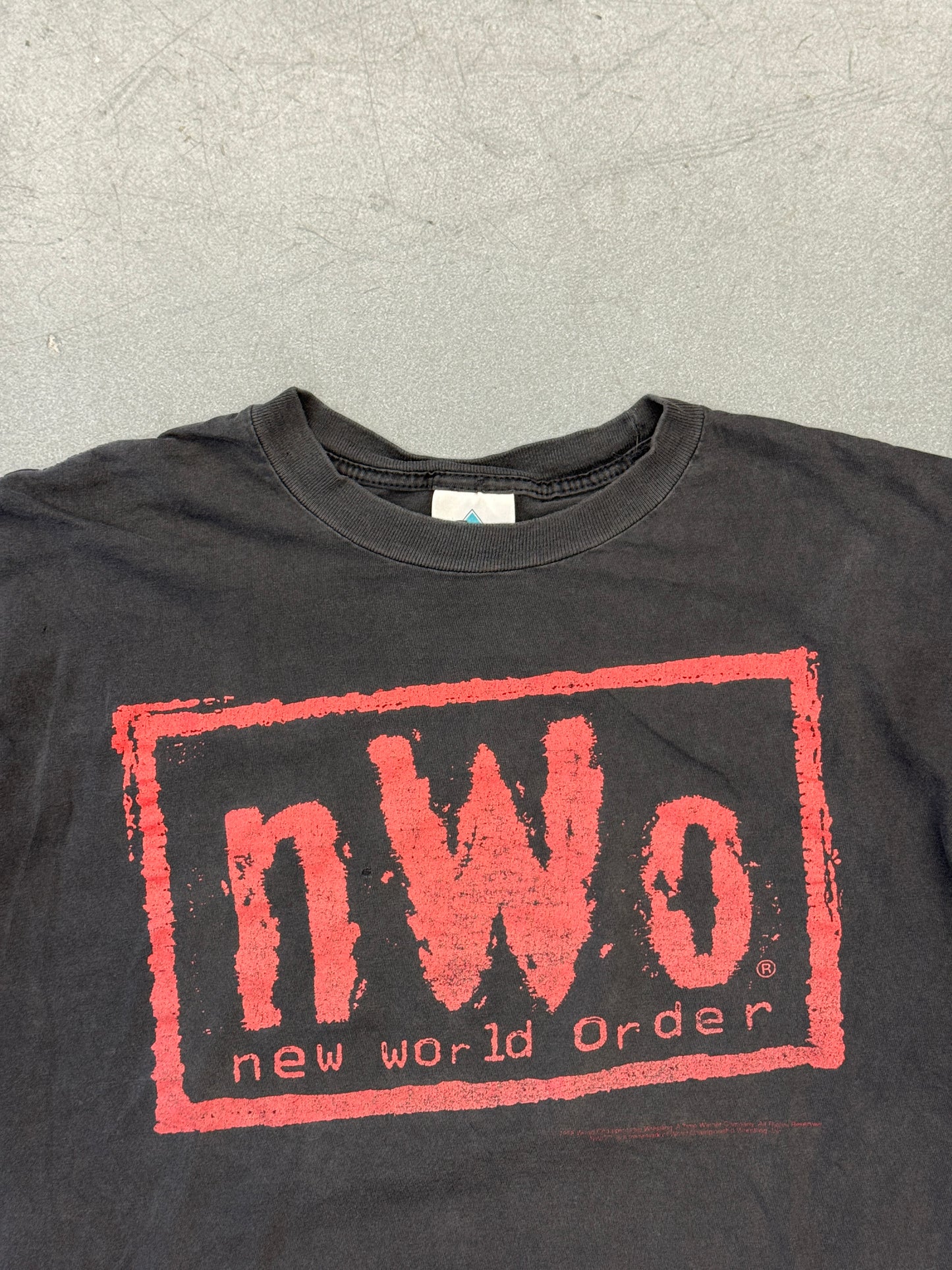 1998 NWO BAD HAS ARRIVED, AND IT'S HERE TO STAY TEE (CHAMP TAG)