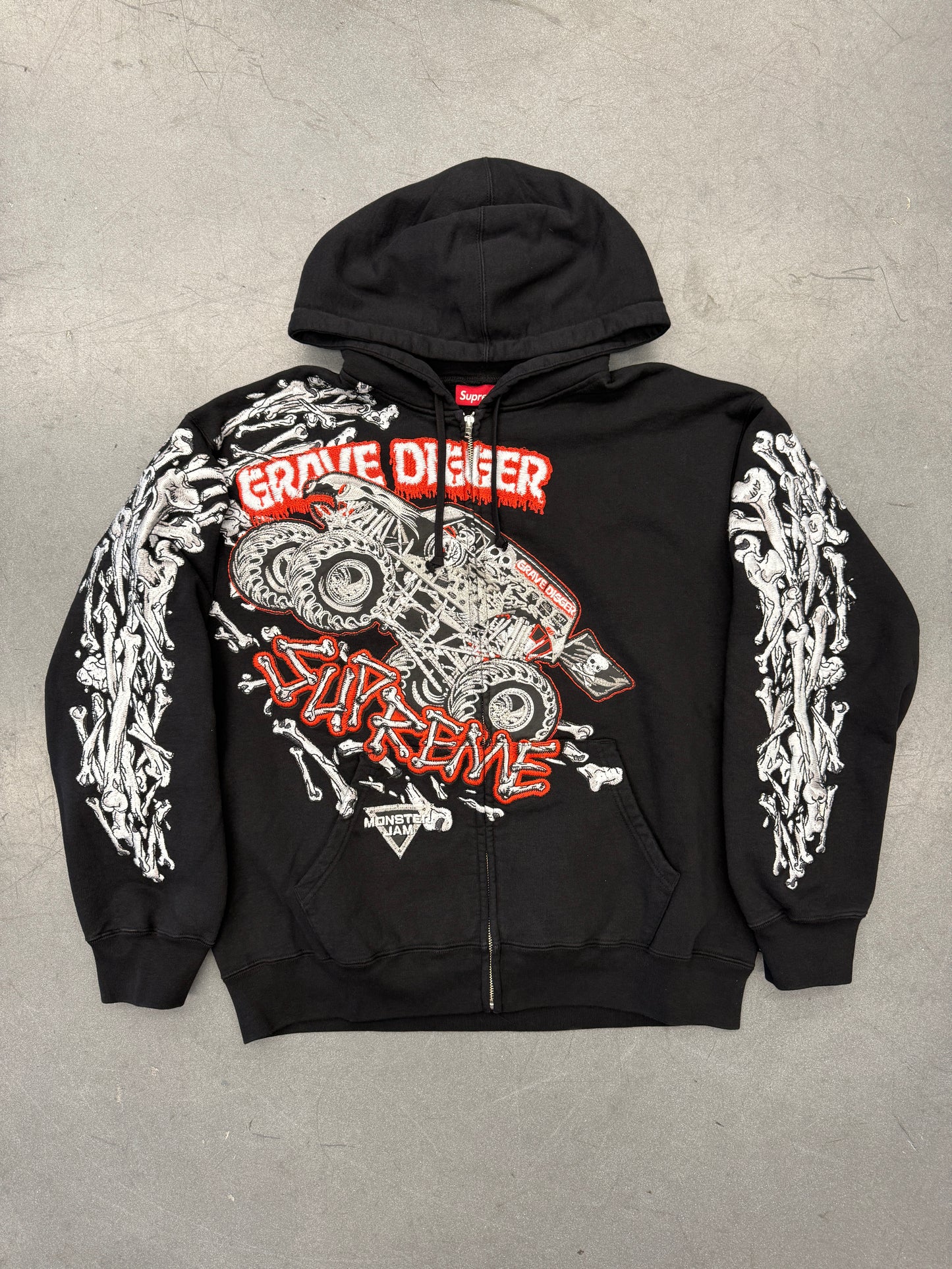 SS26 SUPREME MONSTER JAM GRAVE DIGGER BONES ZIP UP HOODED SWEATSHIRT