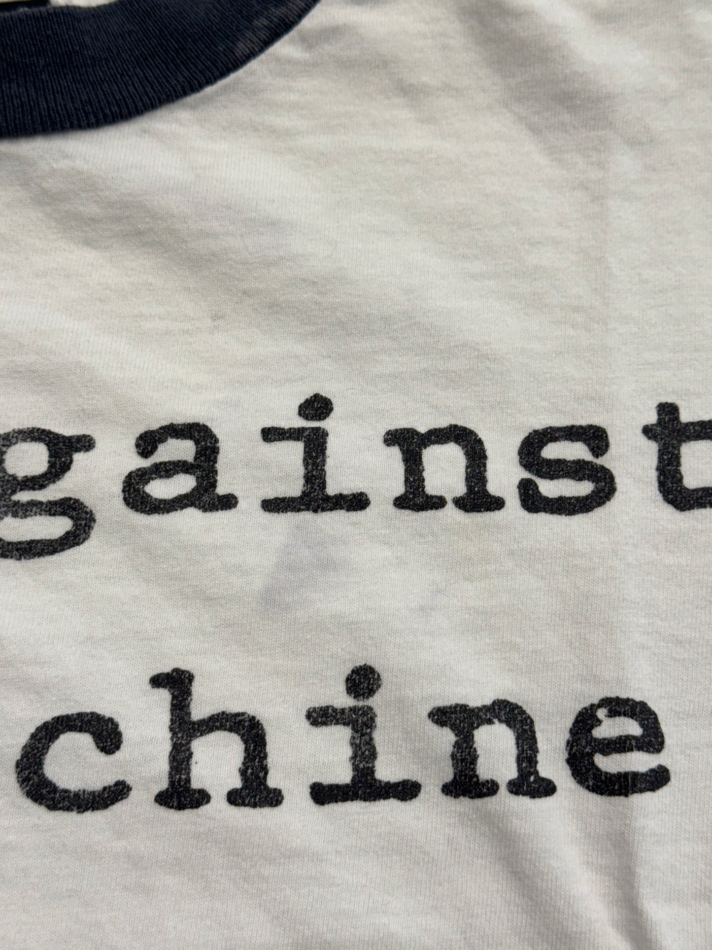 90S RAGE AGAINST THE MACHINE UNITED NATIONS REPORT BABY RINGER TEE (GIANT TAG)
