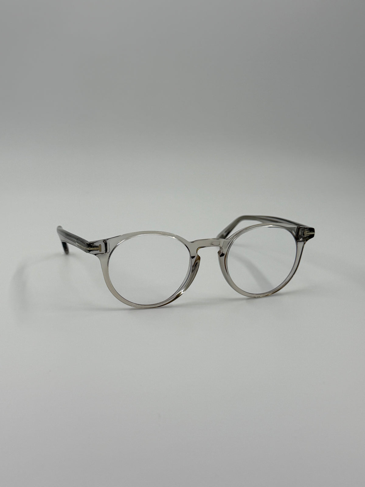 TOM FORD TF5557-B CLEAR ROUNDED FRAME GLASSES