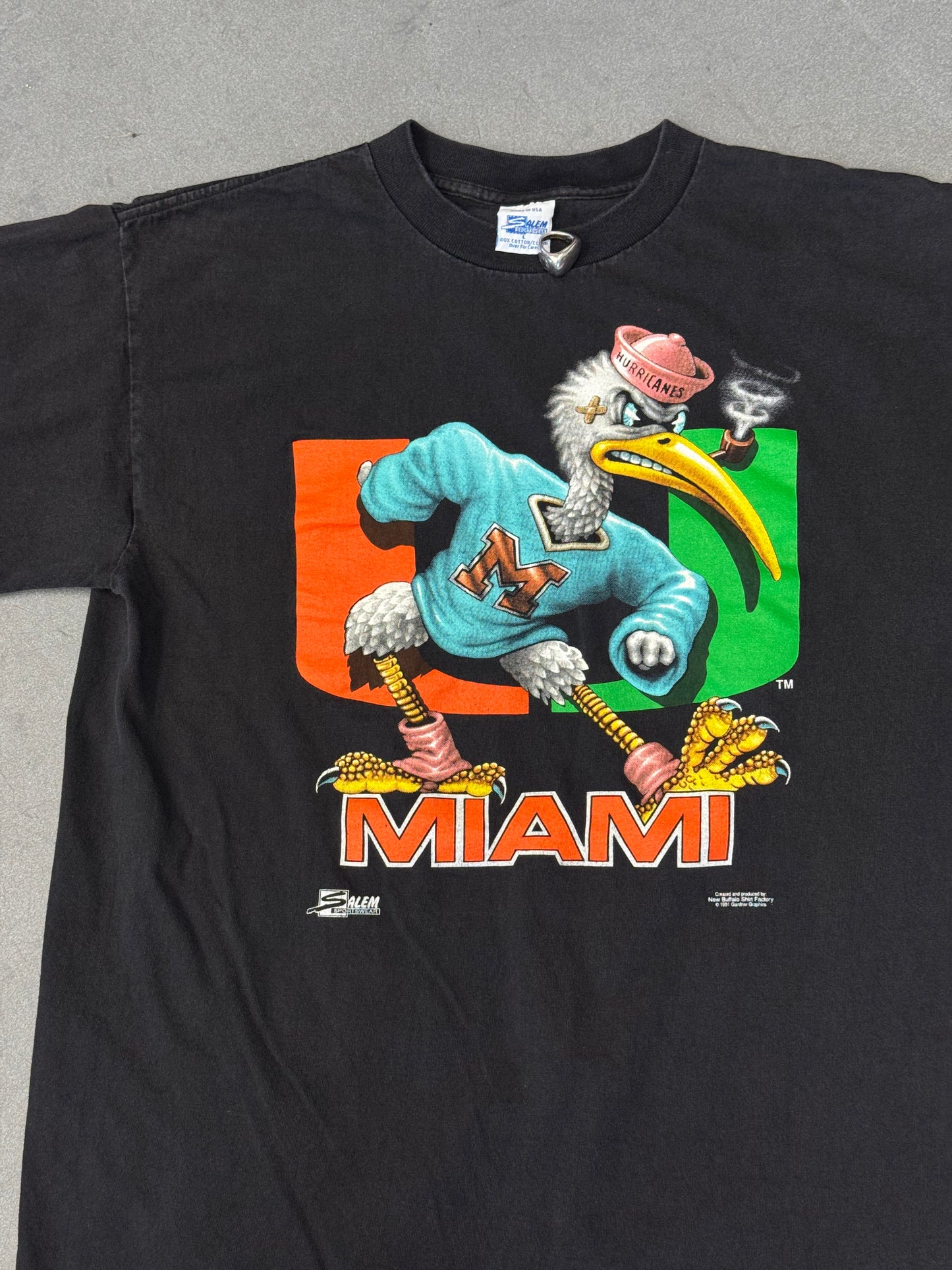 1991 SALEM SPORTSWEAR UNIVERSITY OF MIAMI BLUE CREWNECK SEBASTIAN TEE