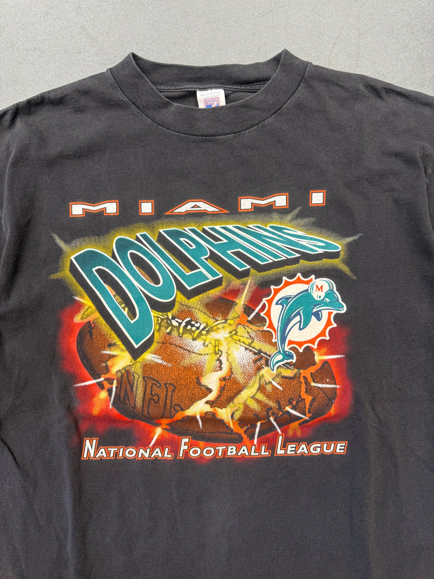 90S MIAMI DOLPHINS EXPLODING FOOTBALL TEE (LOGO 7 TAG)