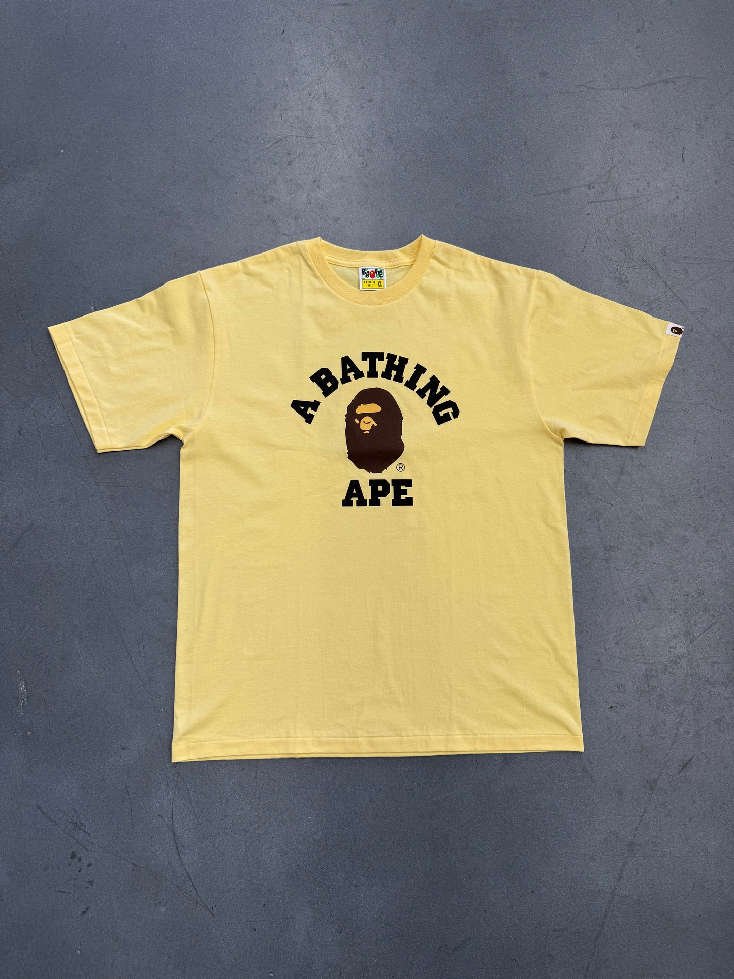 A BATHING APE COLLEGE TEE - YELLOW (XL) (NEW IN BAG)