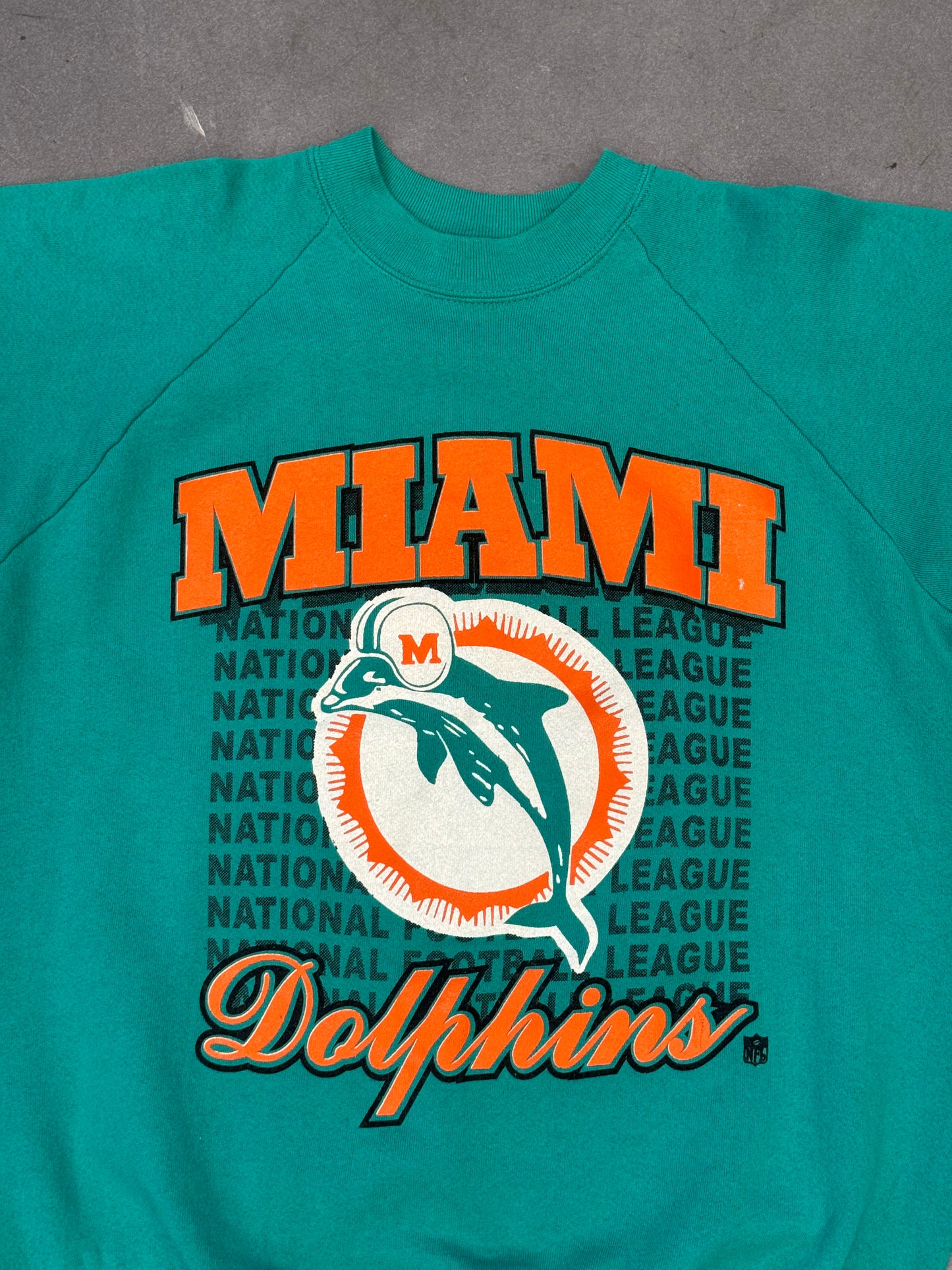 90S MIAMI DOLPHINS NATIONAL FOOTBALL LEAGUE REPEAT PRINT CREWNECK (FOTL TAG)