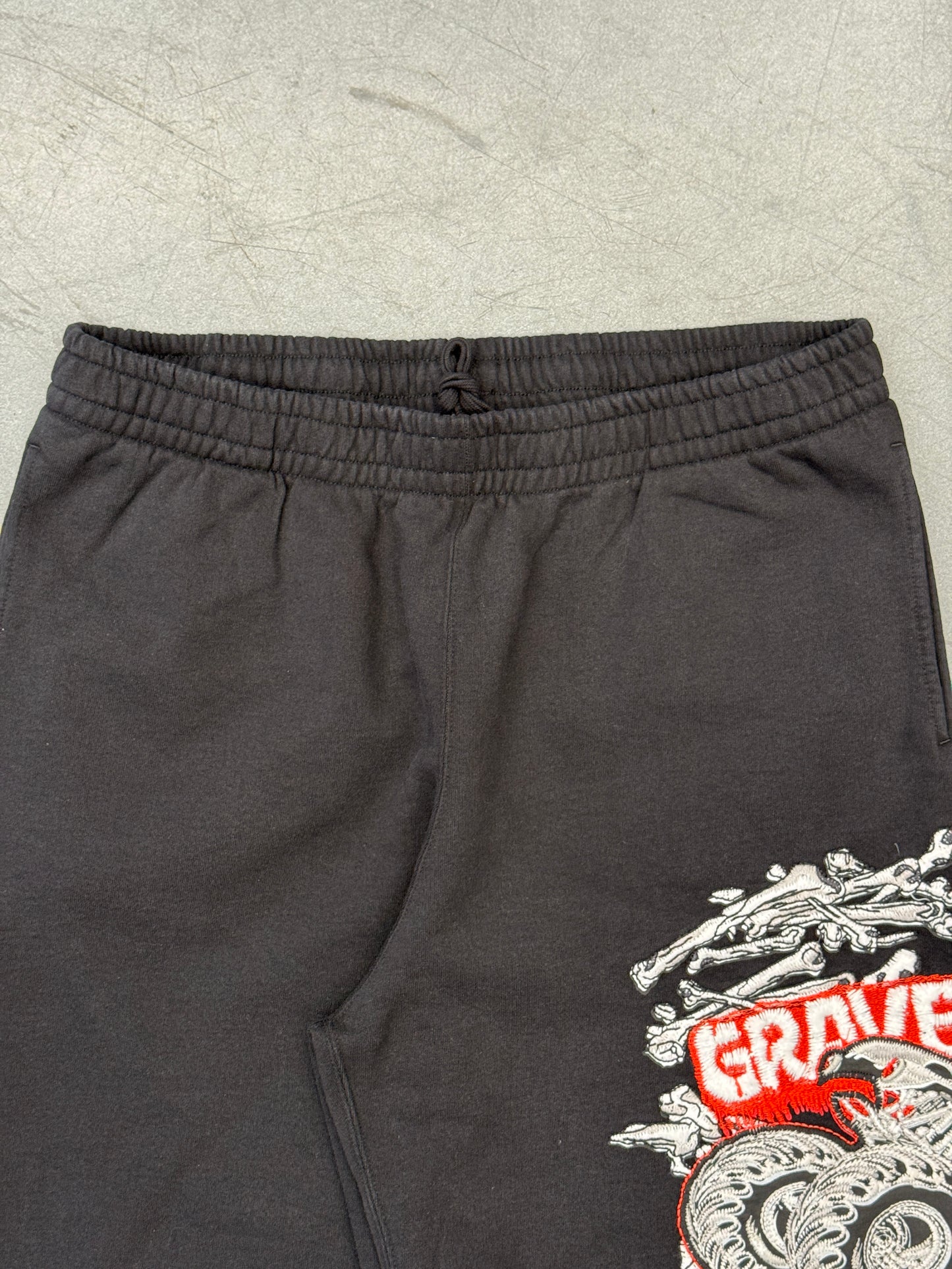 SS26 SUPREME MONSTER JAM GRAVE DIGGER BONES SWEATPANTS