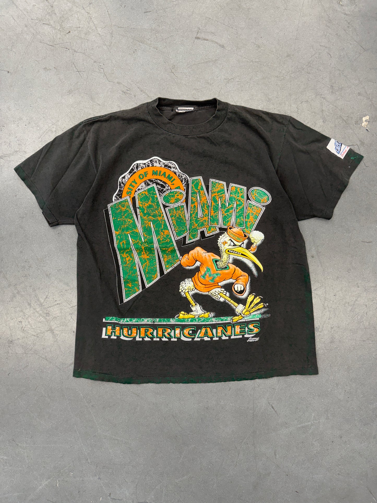 90S UNIVERSITY OF MIAMI HURRICANES CRACKLED CAPITOL GRAPHICS TEE (PULLED TAG)
