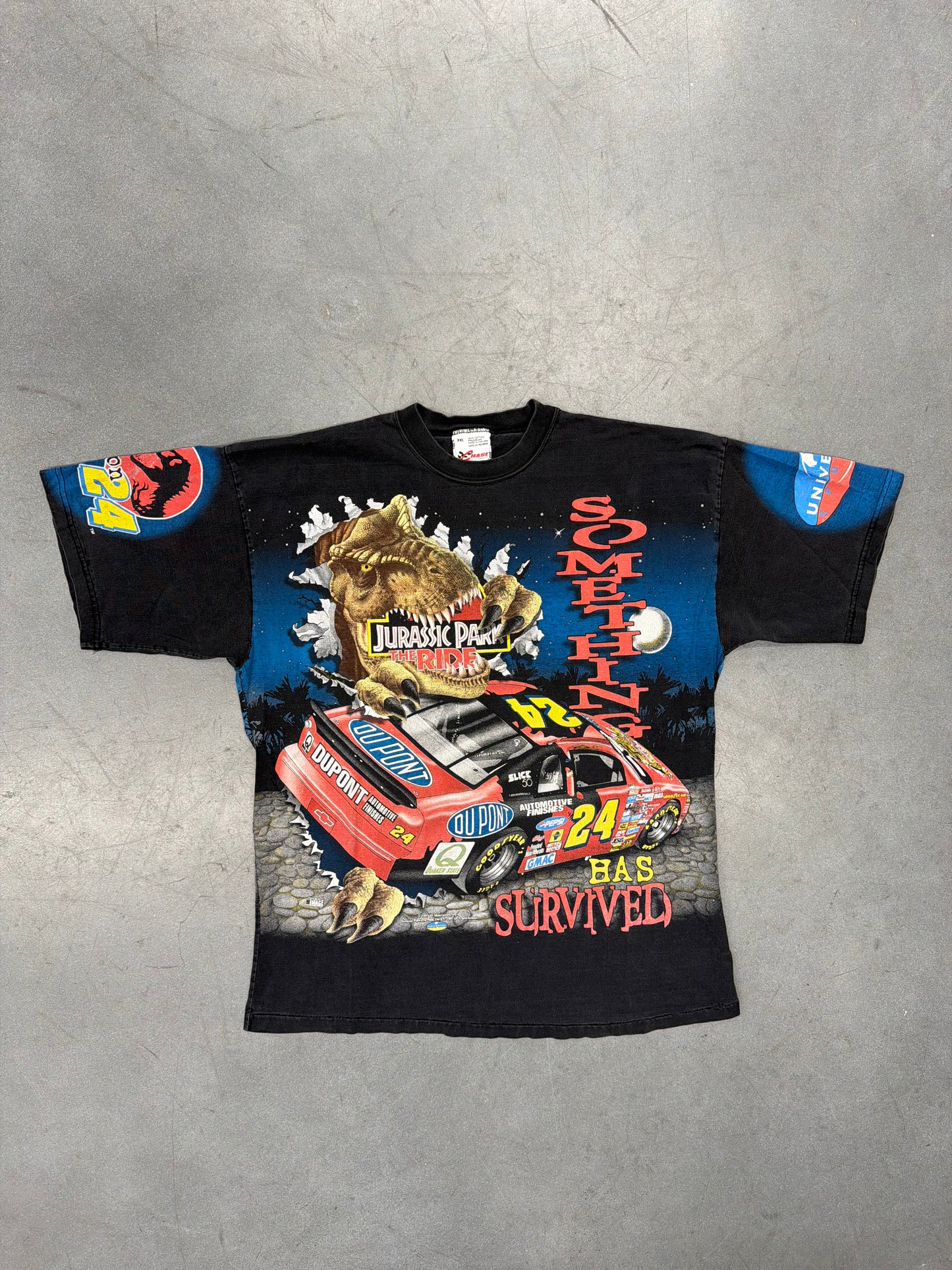 1997 JEFF GORDON JURASSIC PARK THE RIDE SOMETHING HAS SURVIVED AOP (CHASE RACE WEAR TAG)