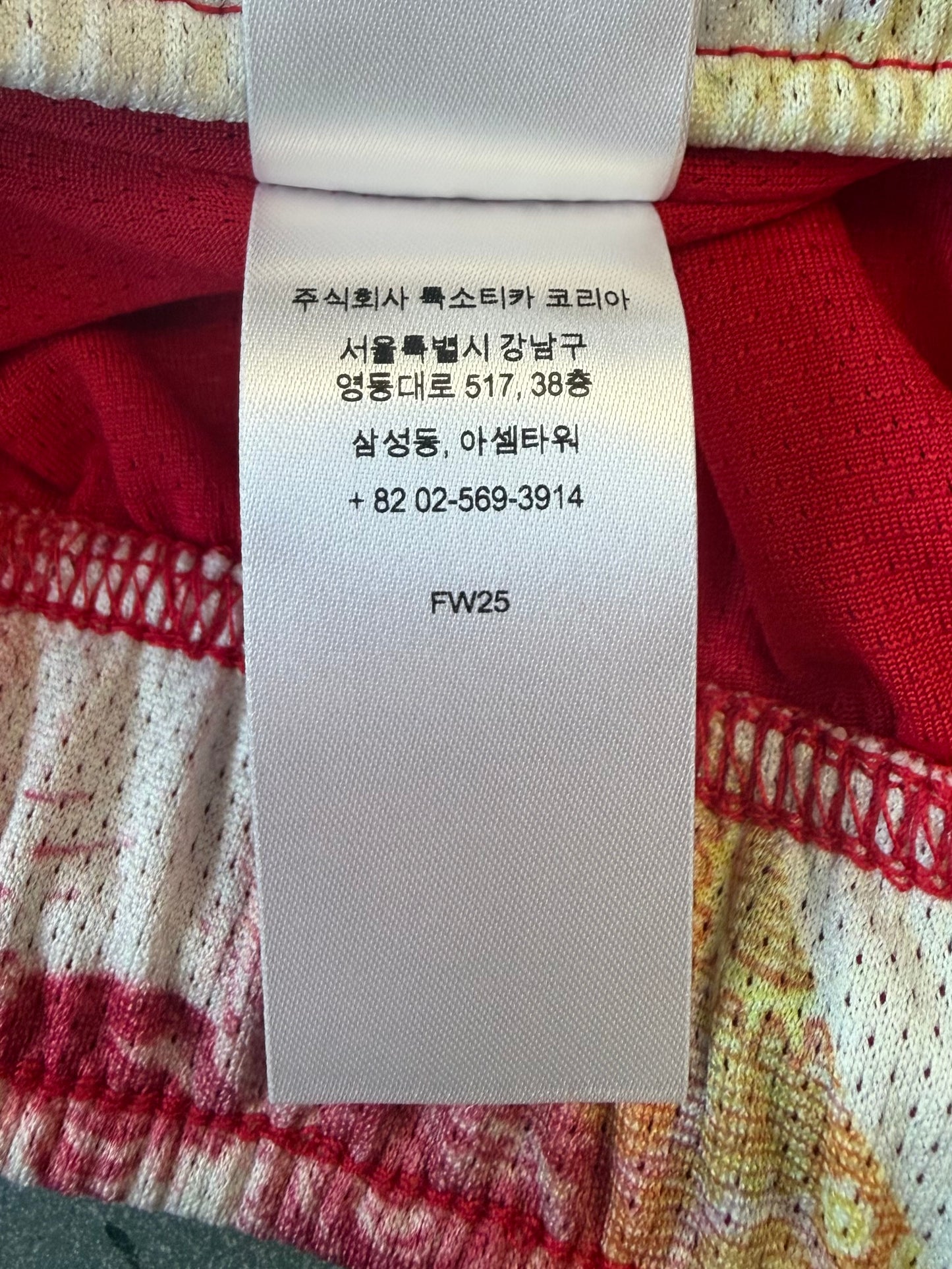 FW25 SUPREME POUNDS SOCCER SHORT - RED