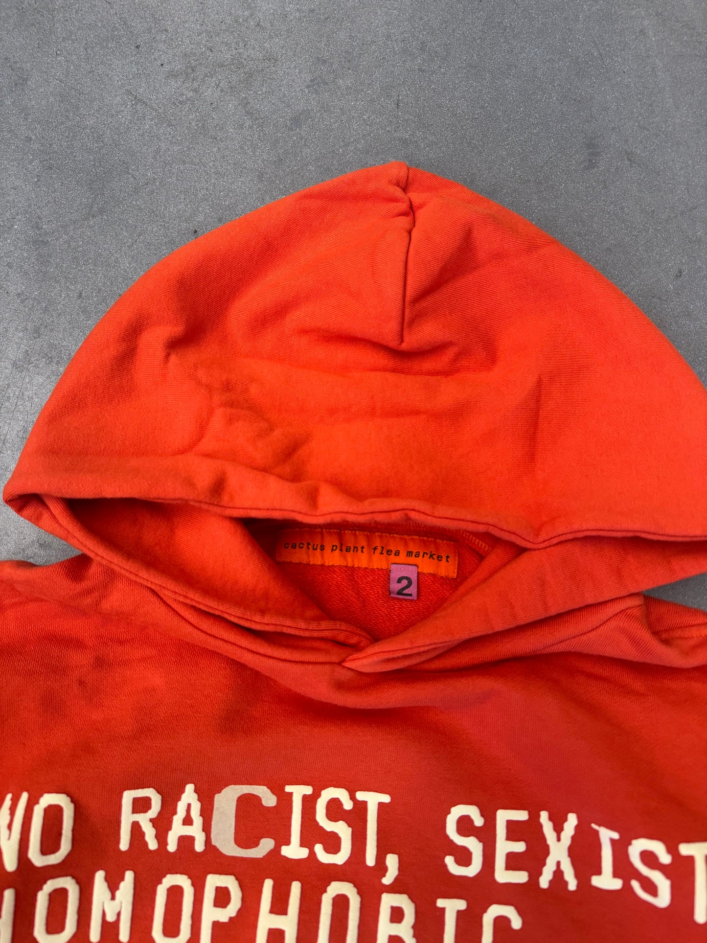 CACTUS PLANT FLEA MARKET WOKE HOODIE - ORANGE