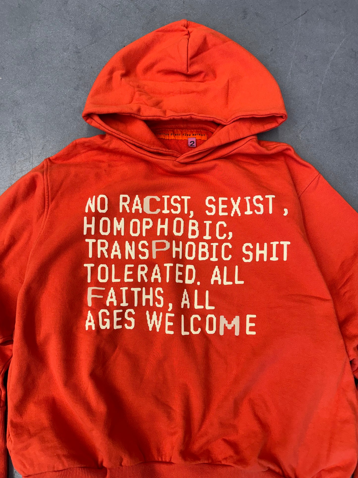CACTUS PLANT FLEA MARKET WOKE HOODIE - ORANGE