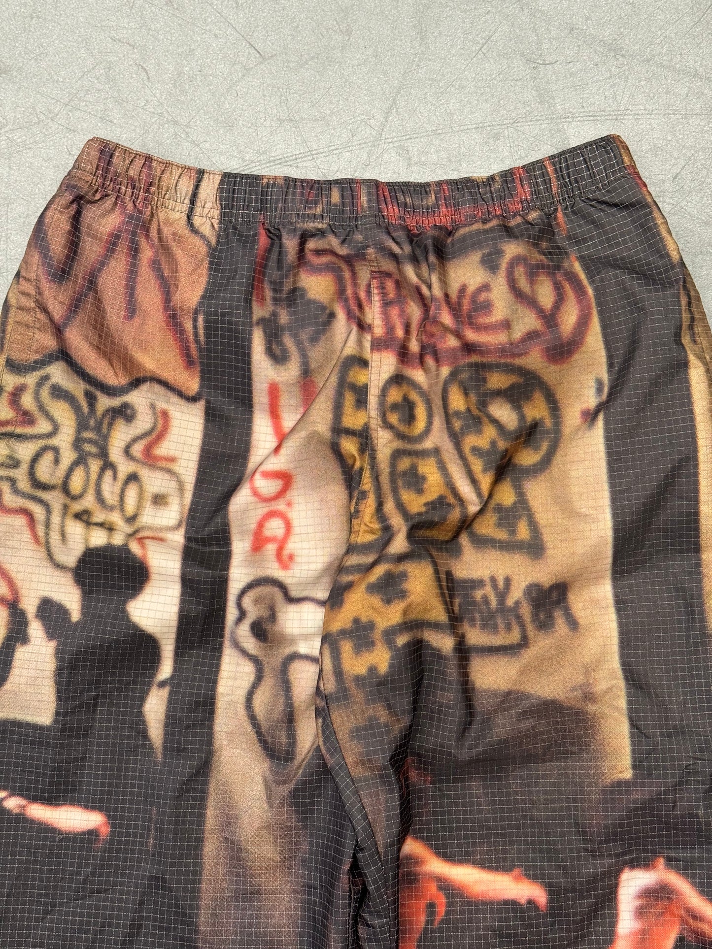 SS25 SUPREME REFLECTIVE RIPSTOP TRACK PANTS